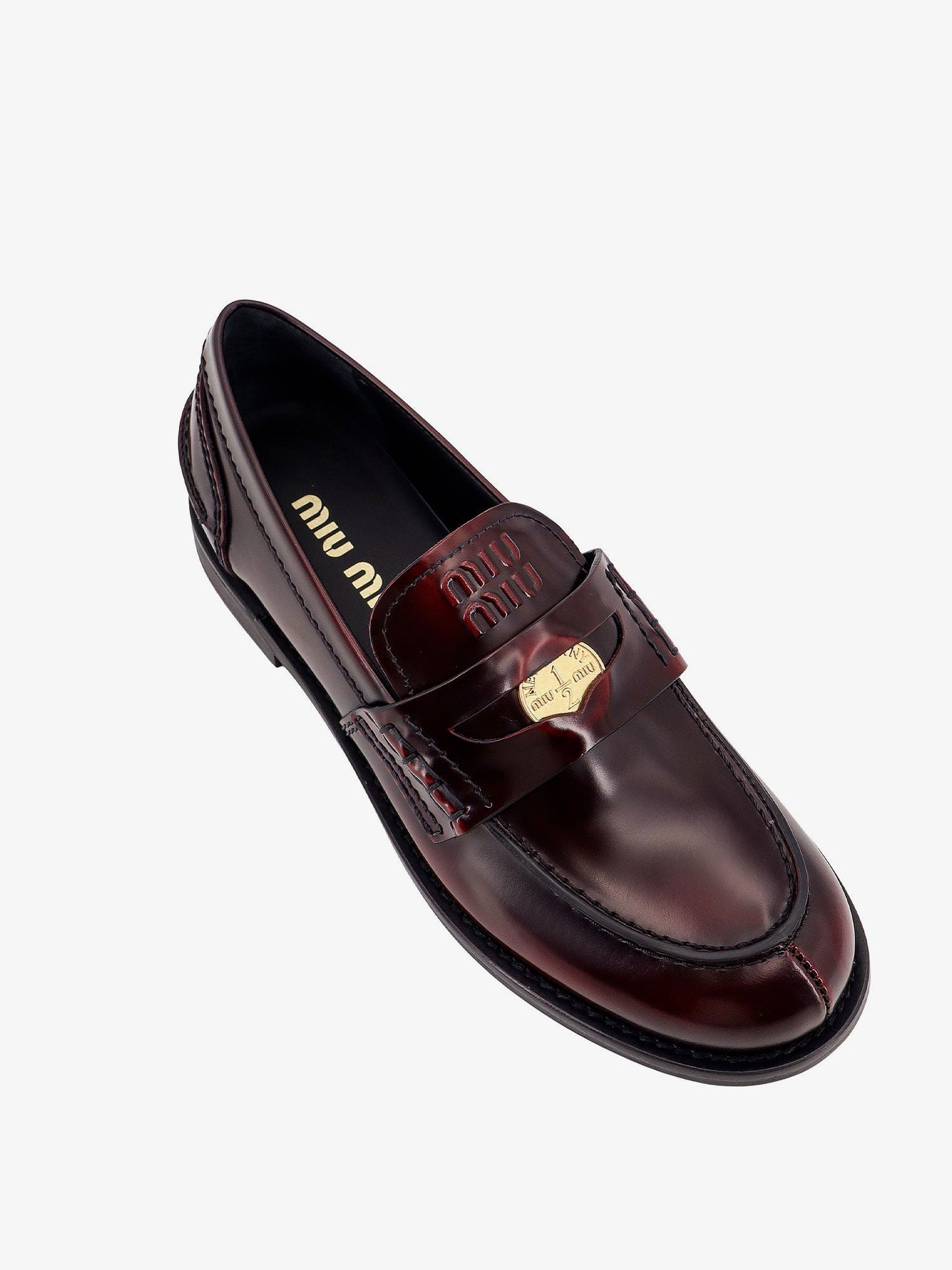 Leather loafer with metal penny