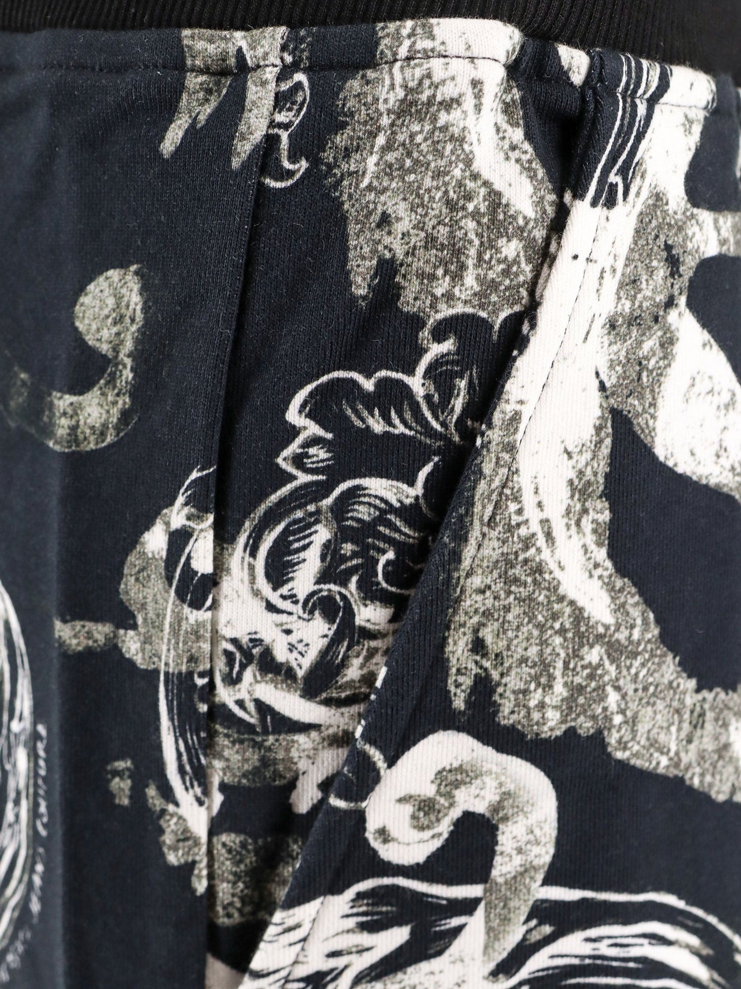 Cotton bermuda shorts with watercolor baroque print