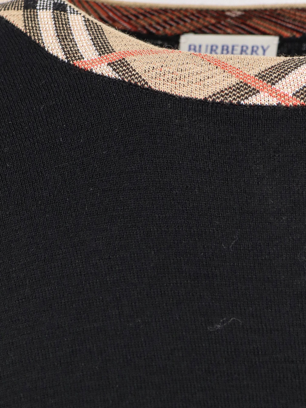 Wool sweater with Check profiles