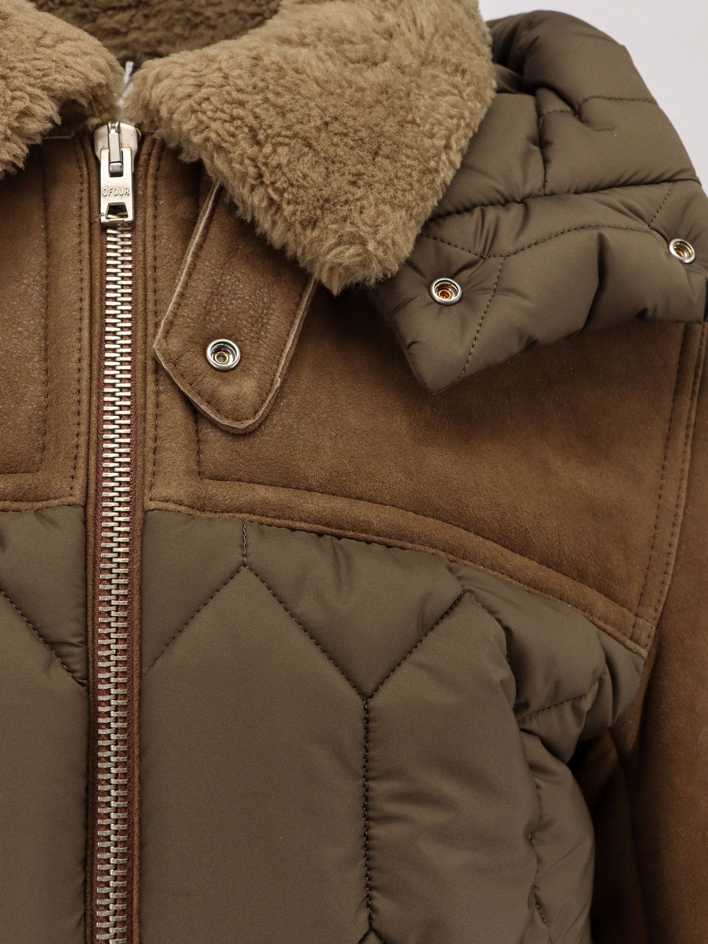 Padded nylon down jacket with leather inserts