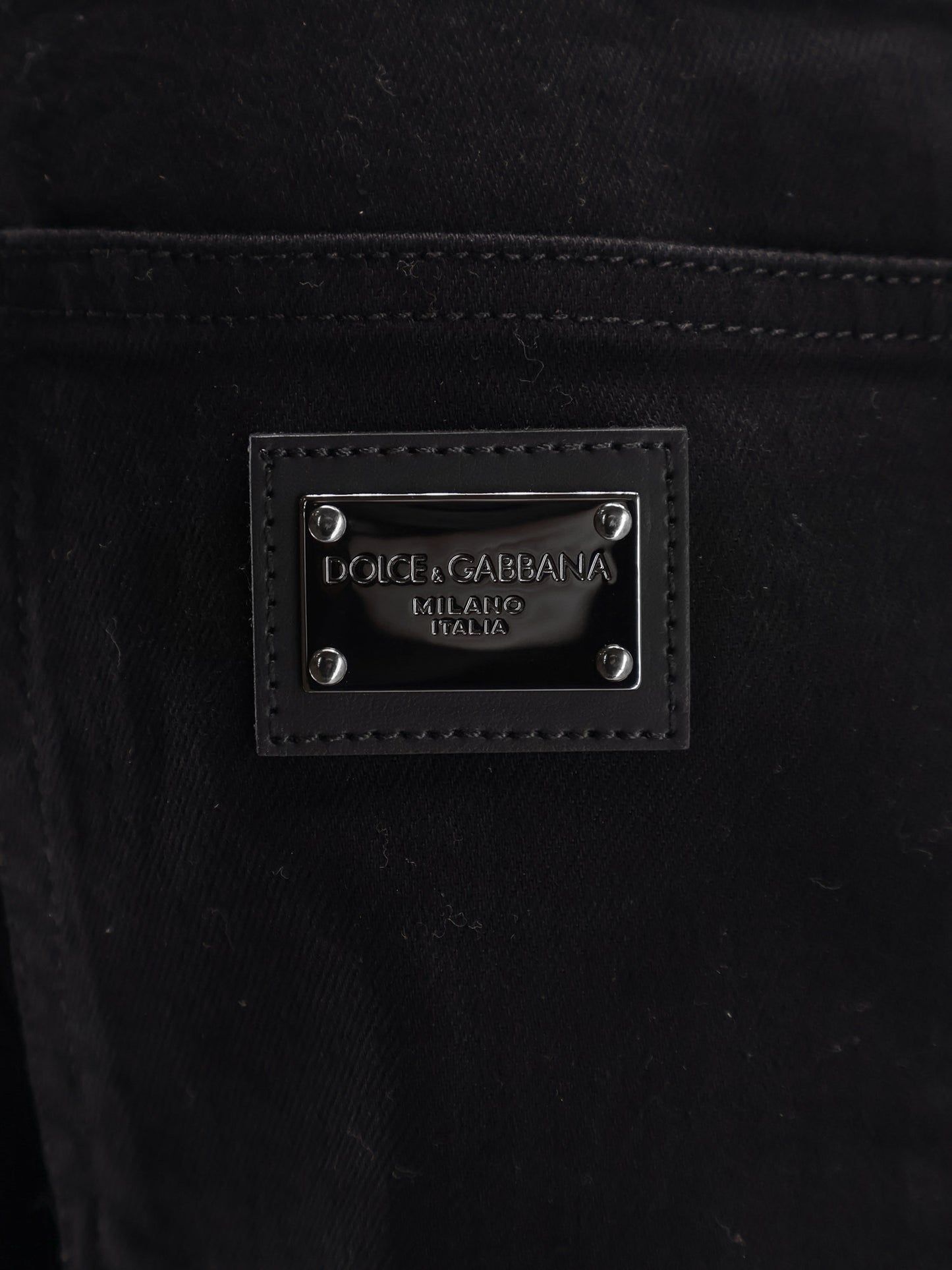 Black denim trousers