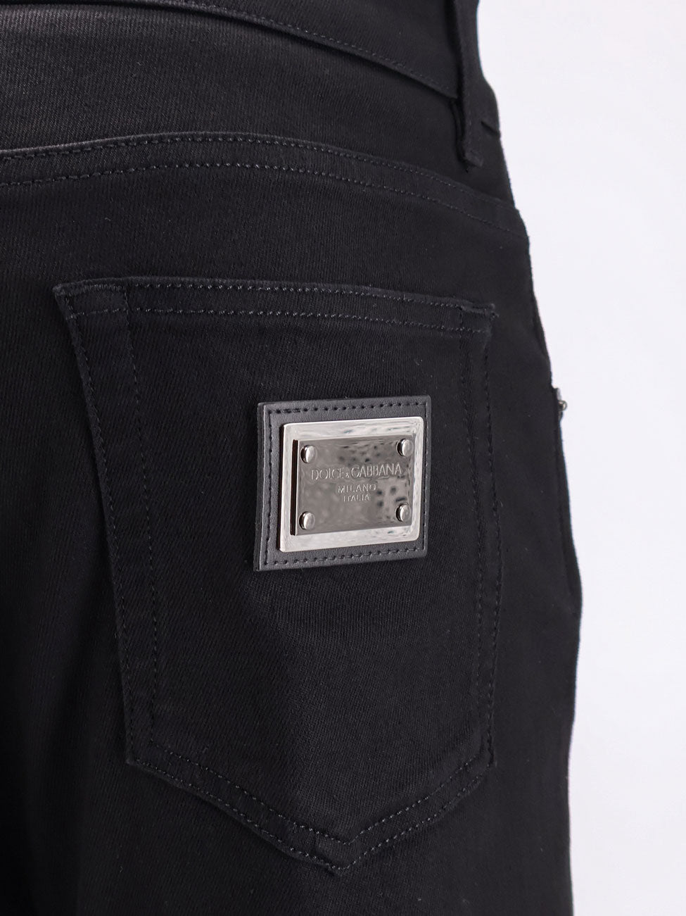 Slim black denim trousers