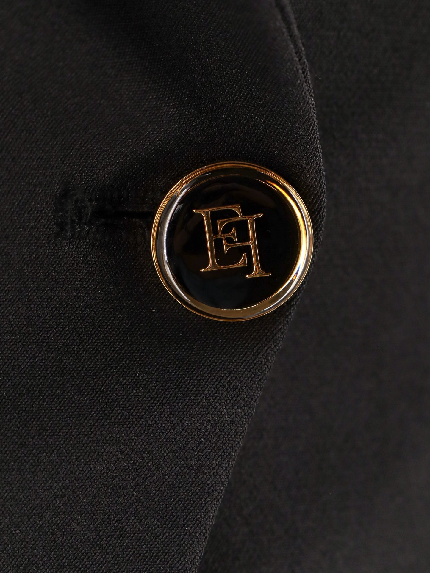 Fitted blazer with logoed buttons