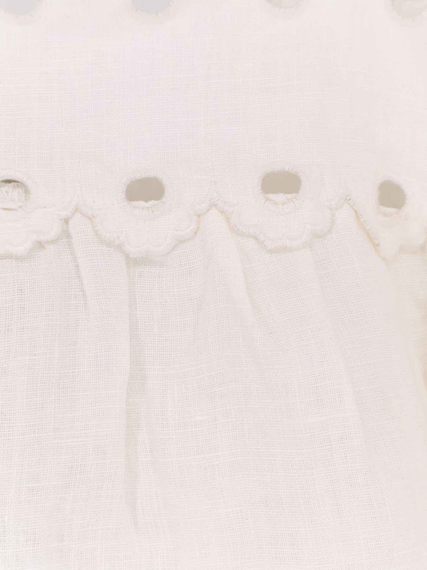 Top in lino traforato