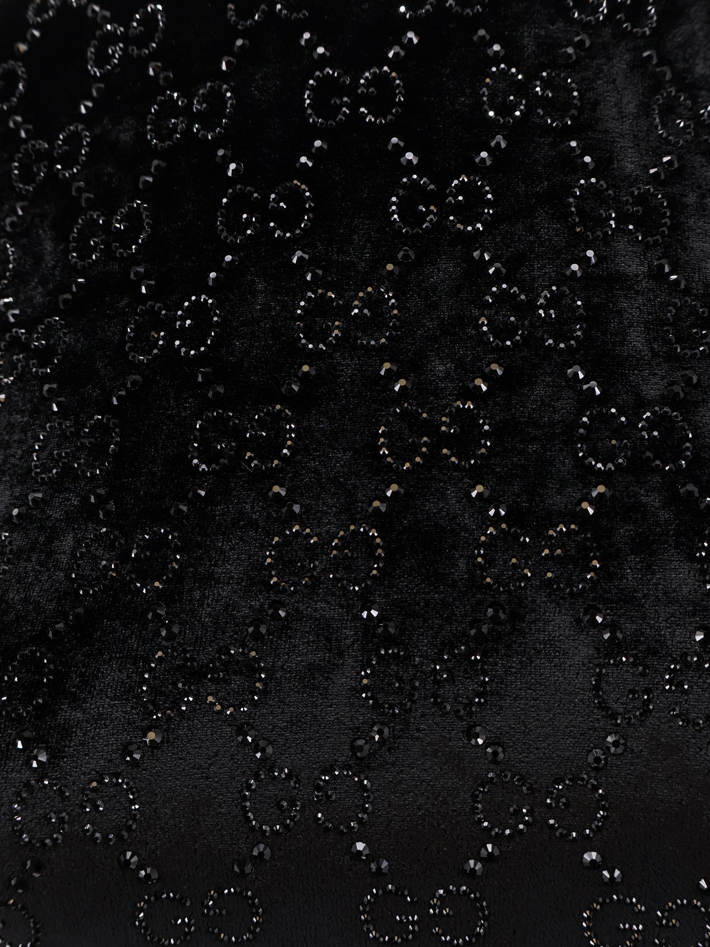 Top in ciniglia con motivo GG in cristalli all-over