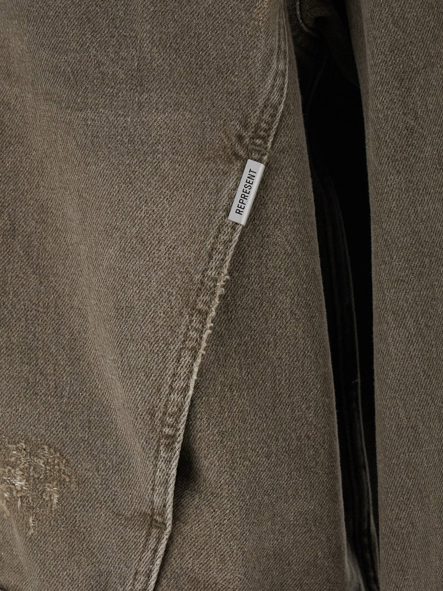 Denim jacket with distressed effect