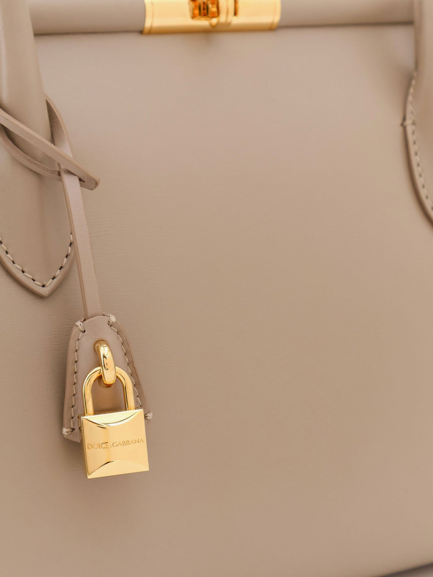 Marlene leather handbag with charm detail on the front