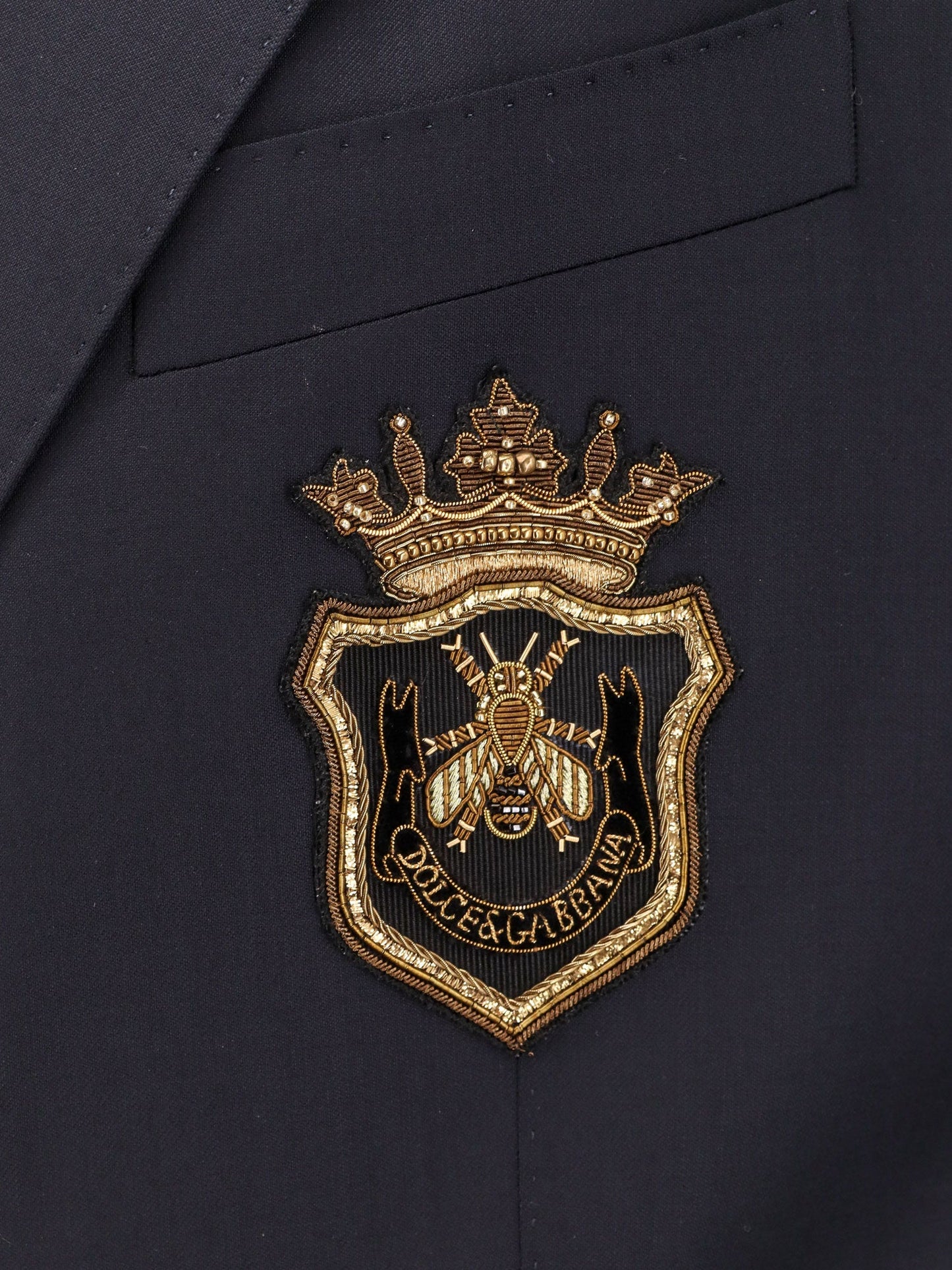 Stretch virgin wool blazer with frontal logo patch