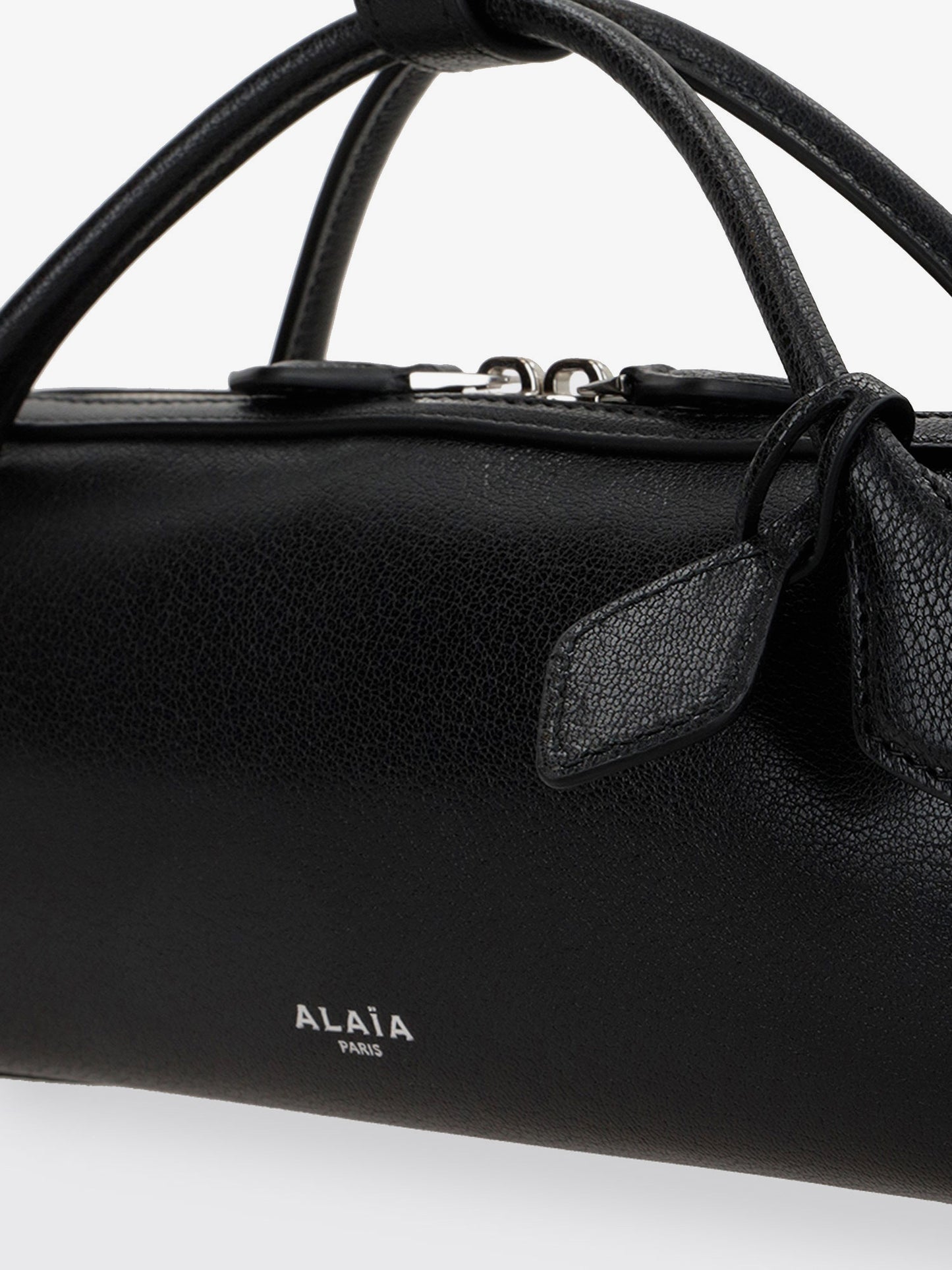 Le Teckel suede clutch bag