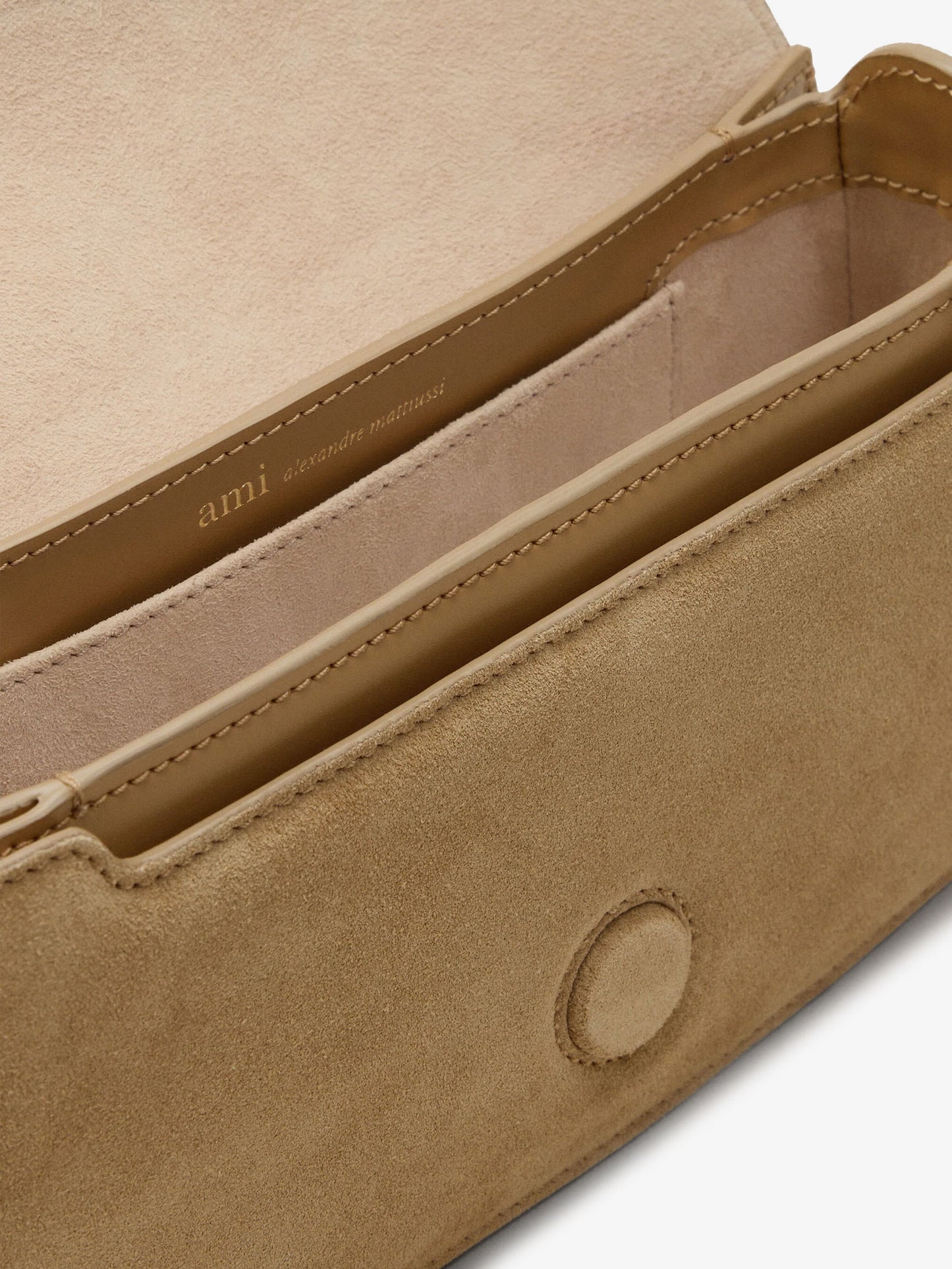 Suede shoulder bag with logo on the front