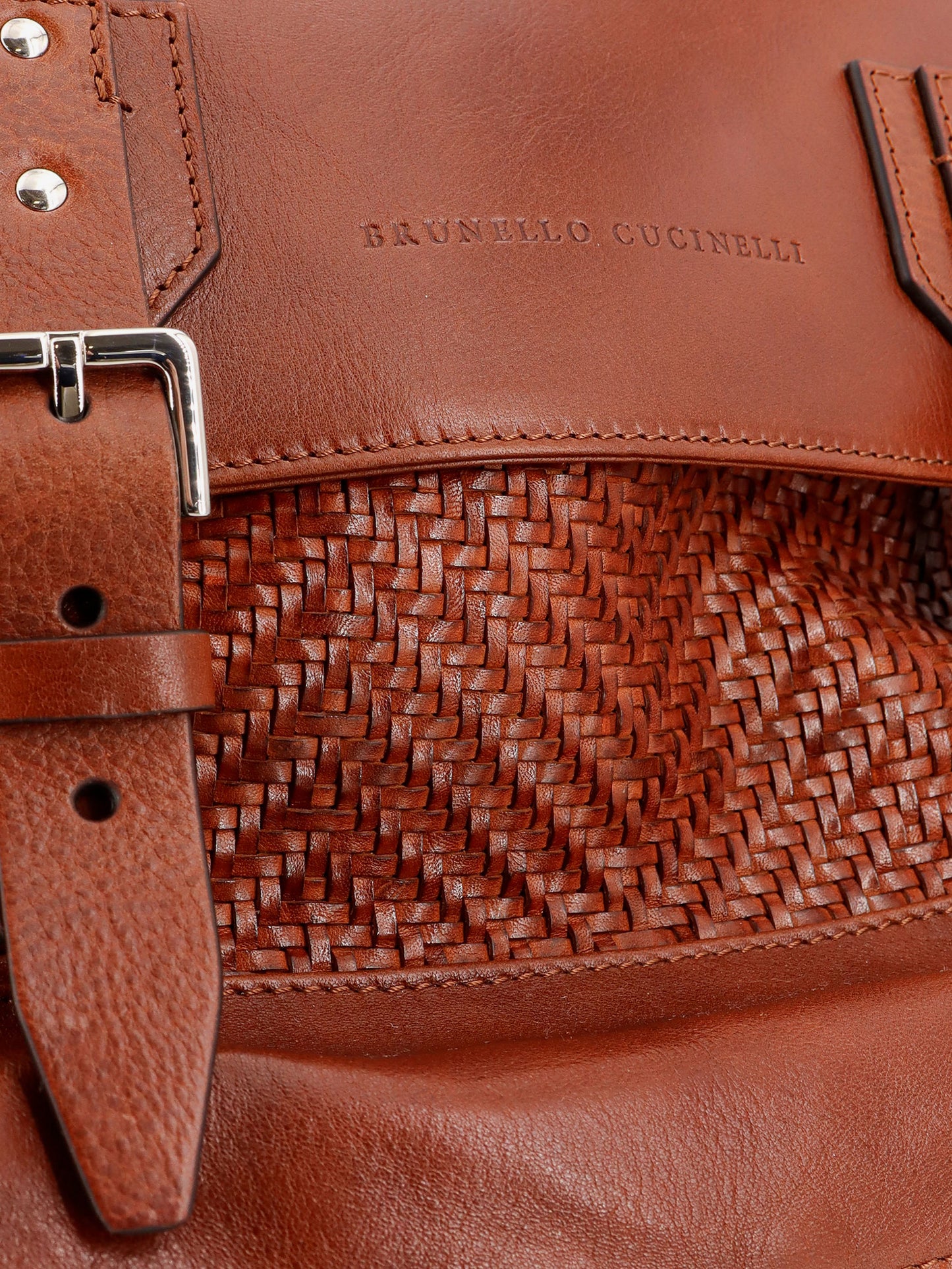 City leather backpack with engraved lettering logo