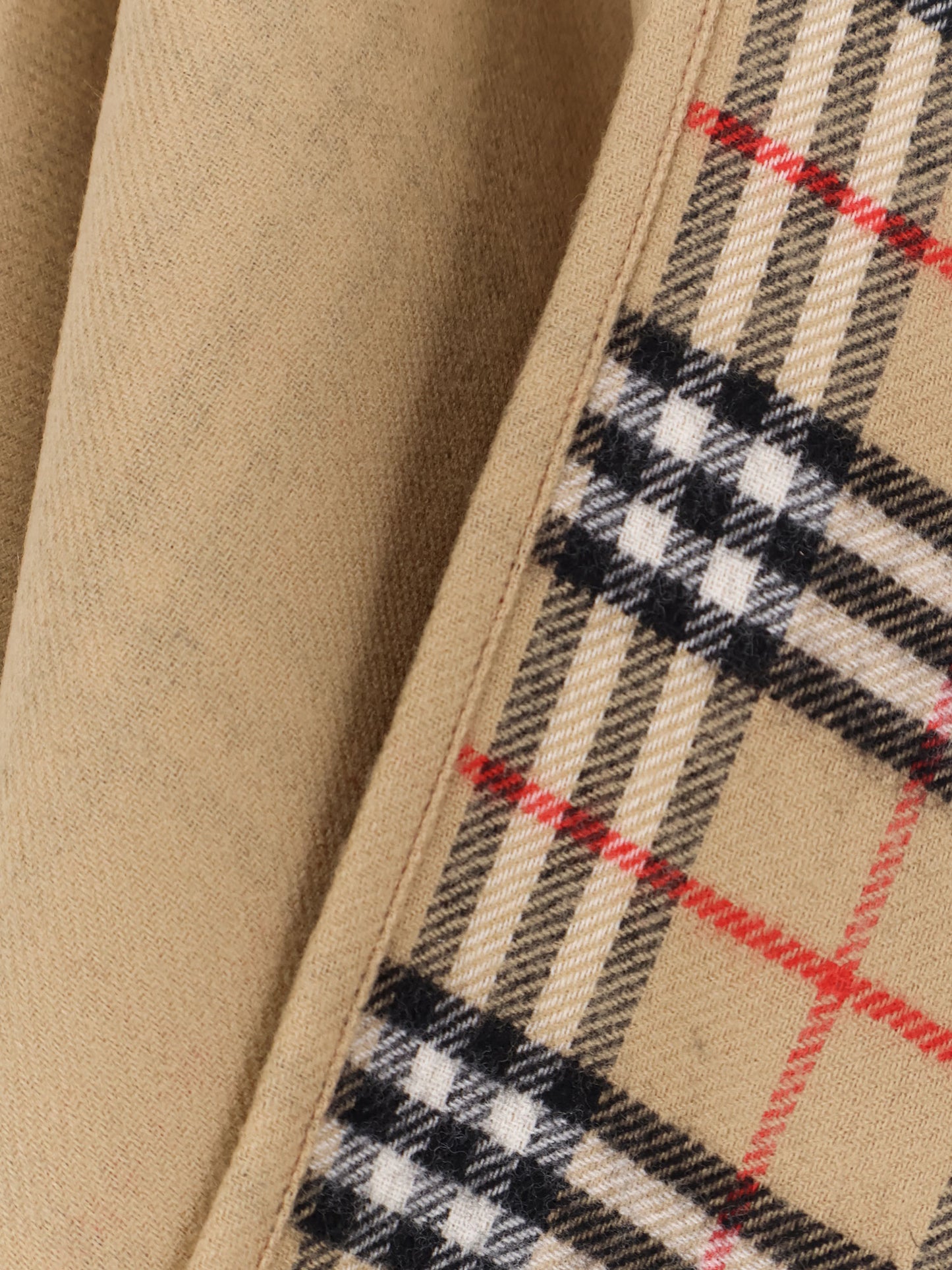 Wool cape with check motif