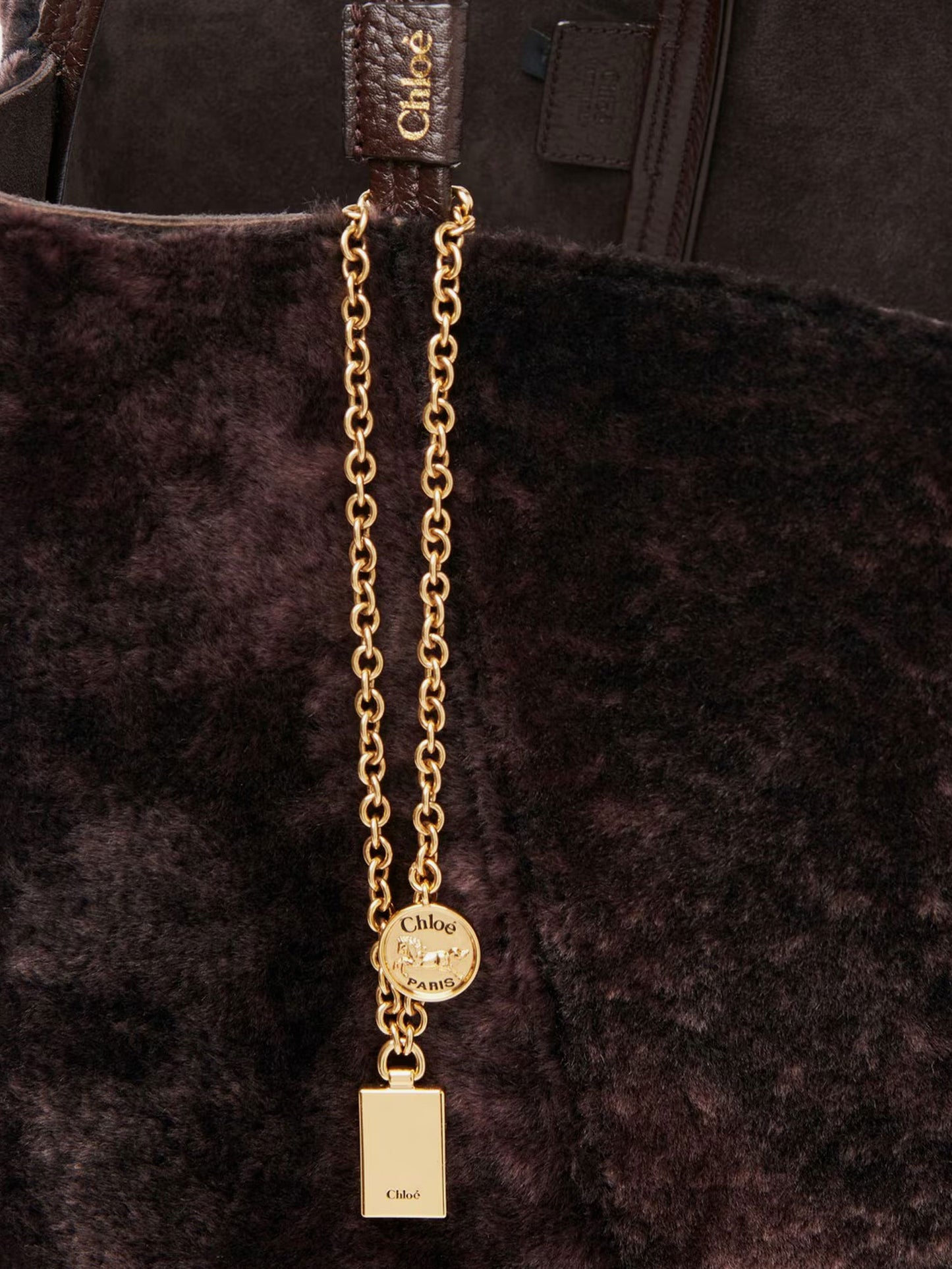 Spin shearling shoulder bag