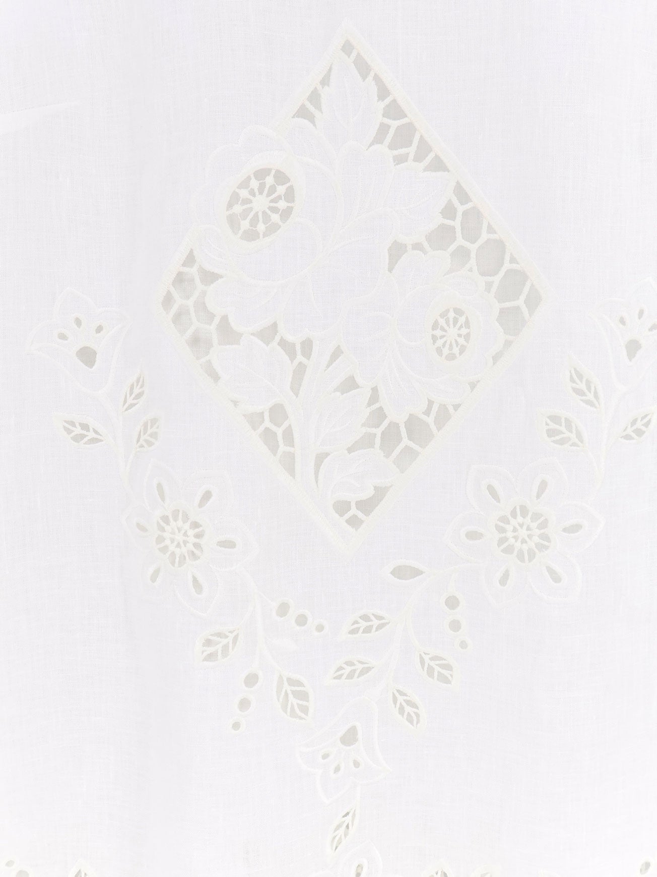 Linen top with floral embroideries