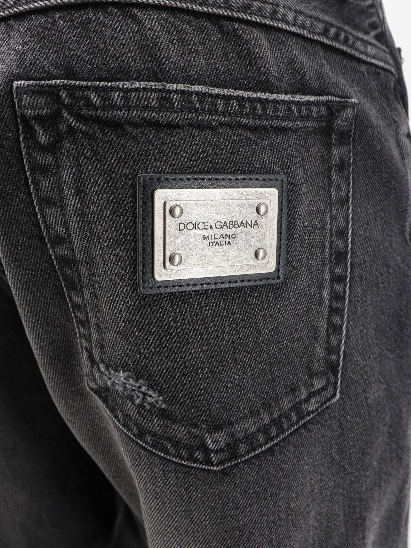 Black denim trousers