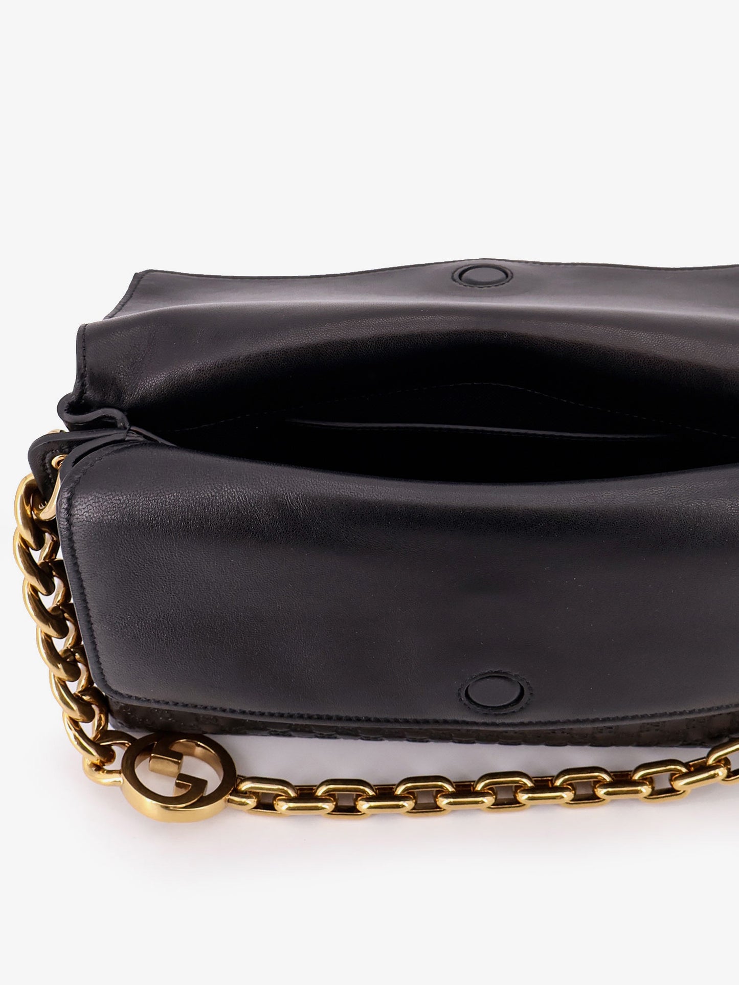 Leather crossbody bag with embossed GG motif