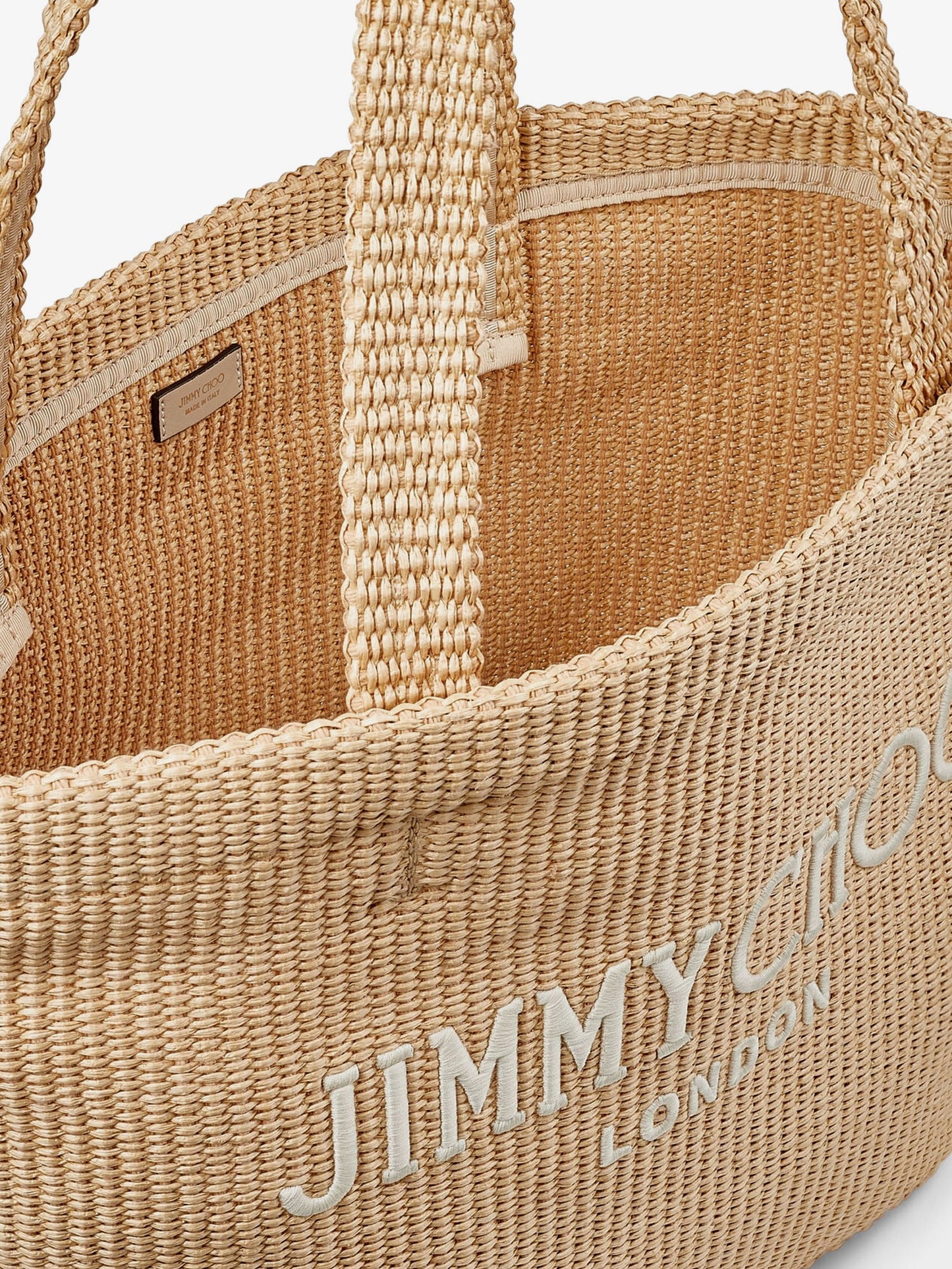 Raffia shopping bag with lettering logo on the front