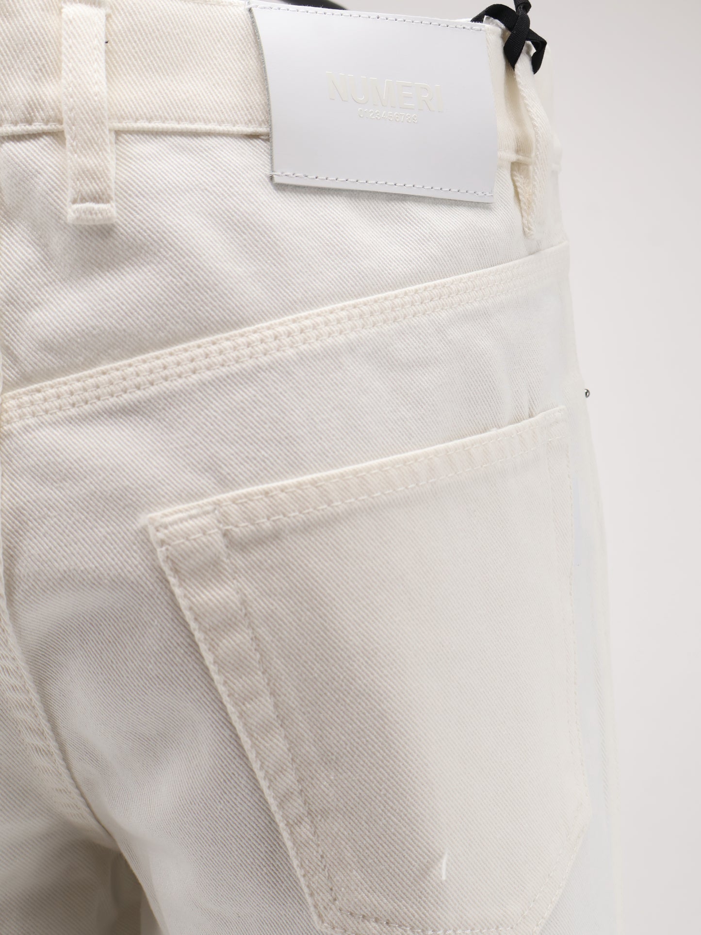 White denim trousers