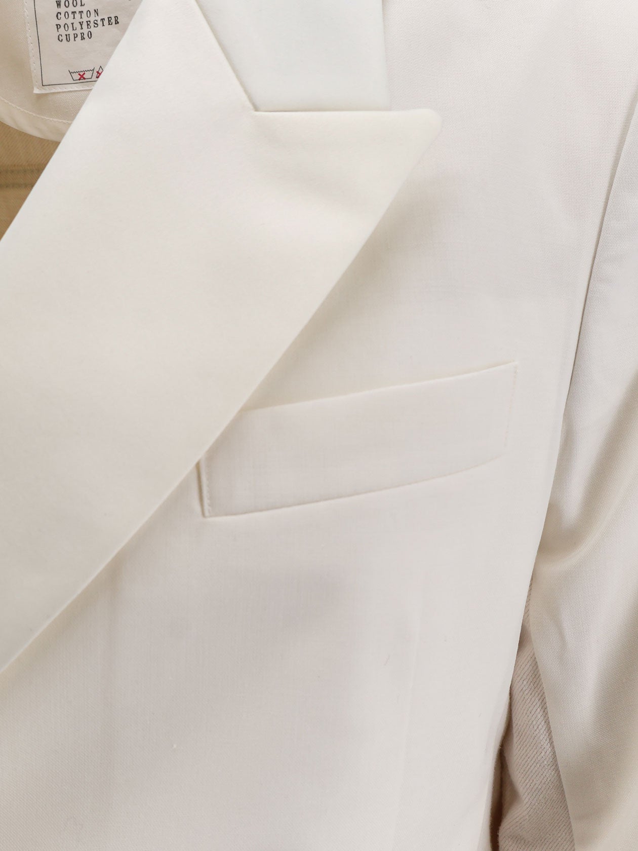 Blazer with white denim insert on the back