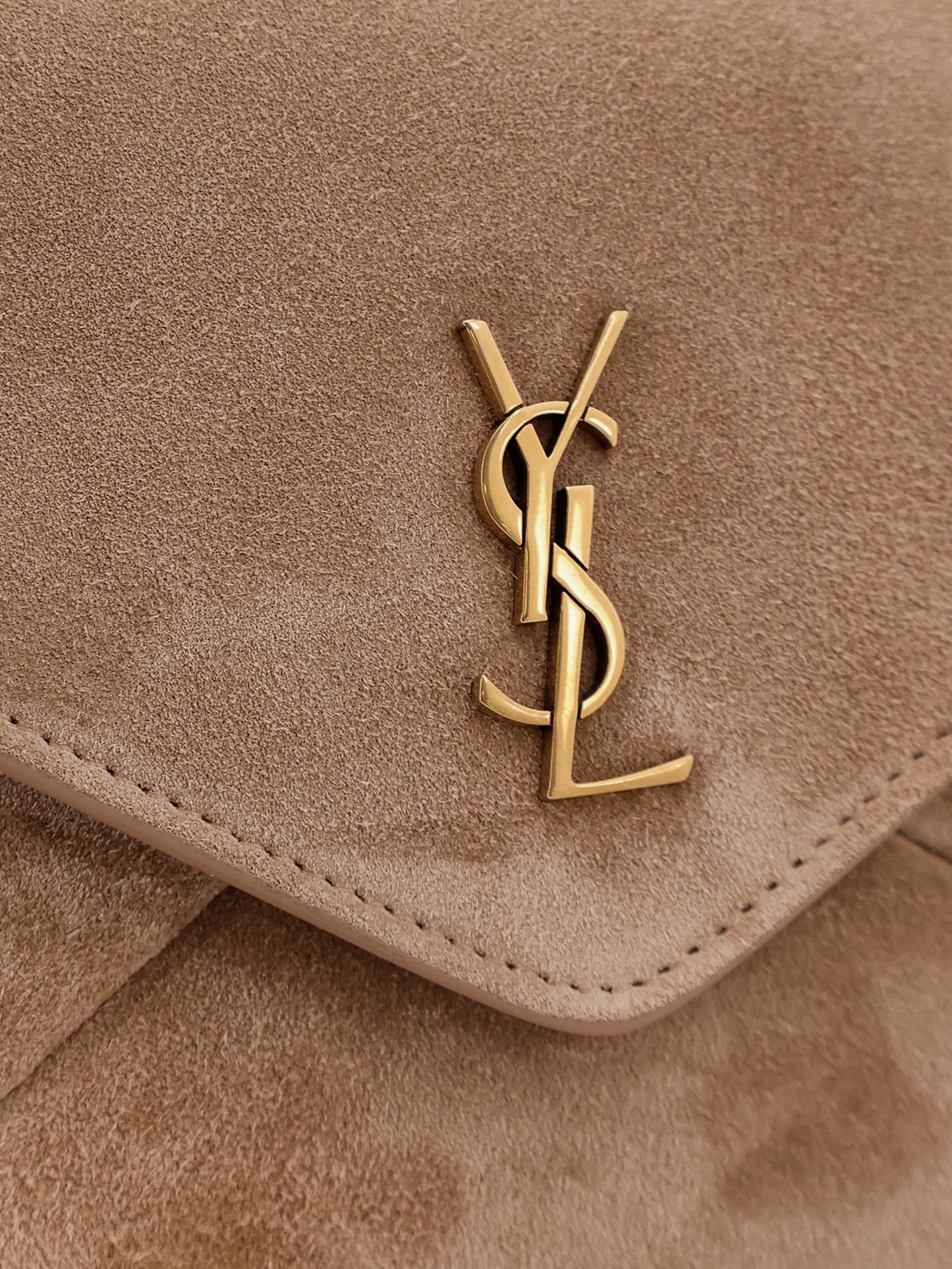 Suede crossbody with metal Cassandre logo