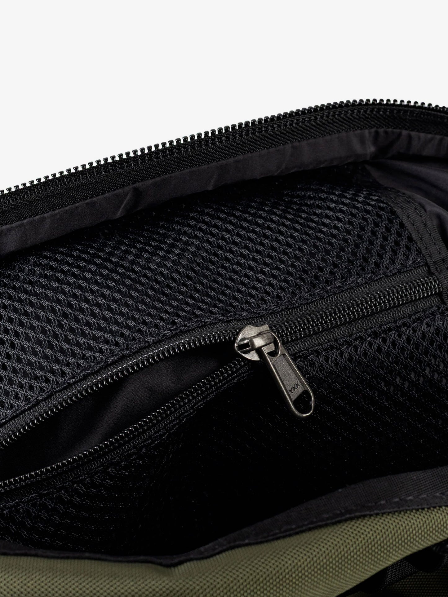 Nylon shoulder bag with logo label on the bottom