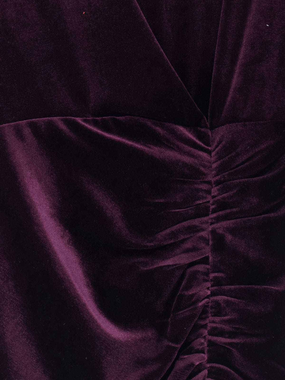 Velvet dress with drapery