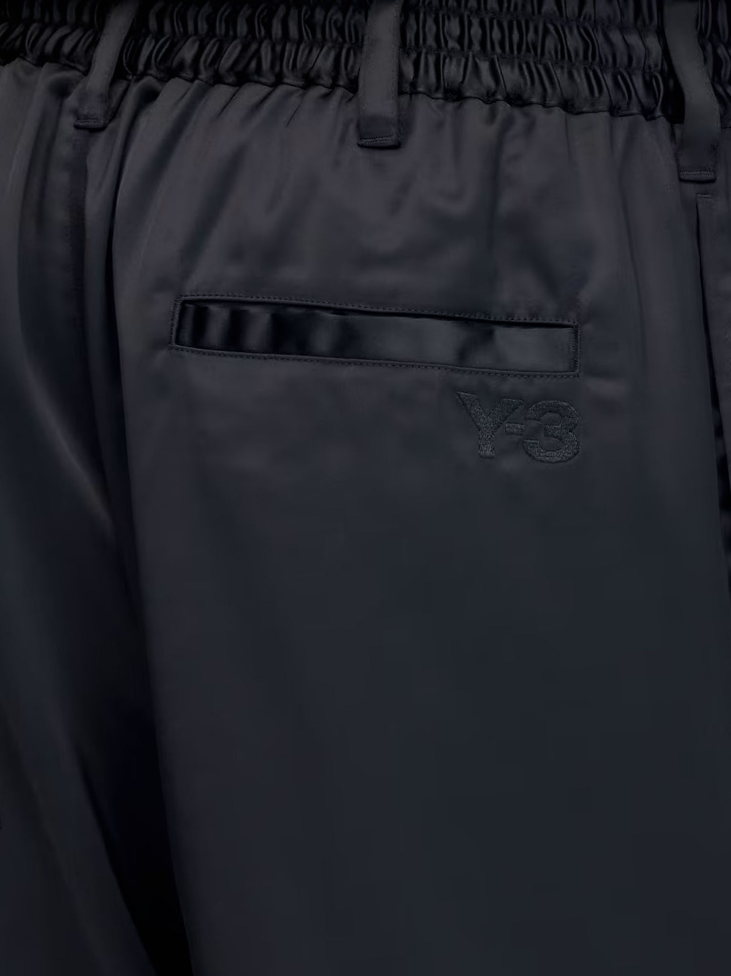 Technical fabric trousers with iconic side stripes