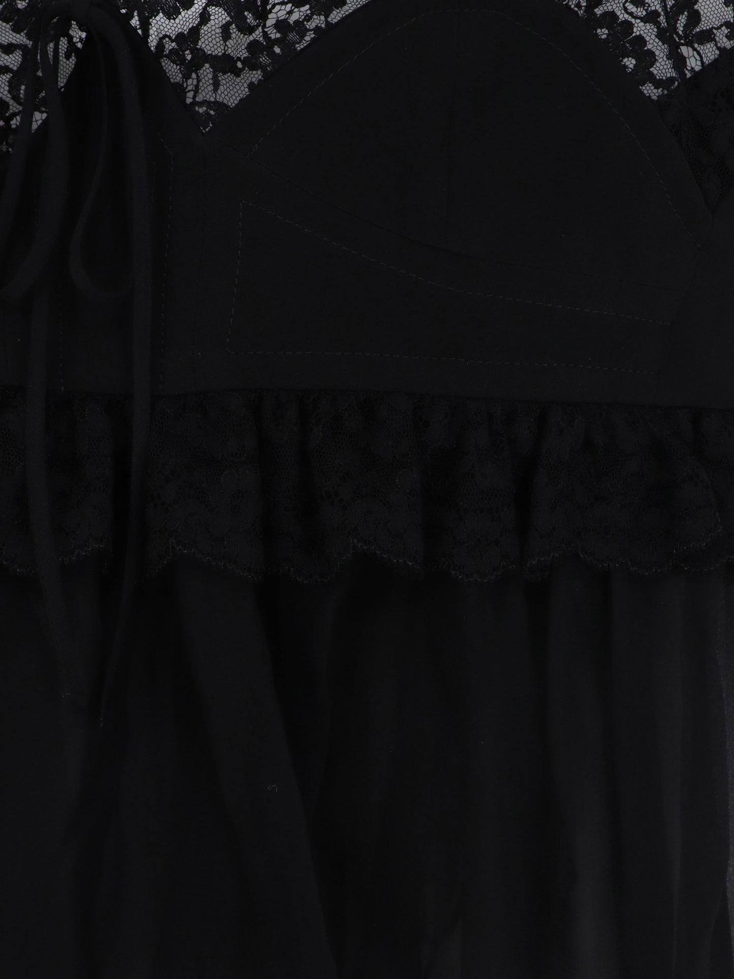 Silk top with lace profiles