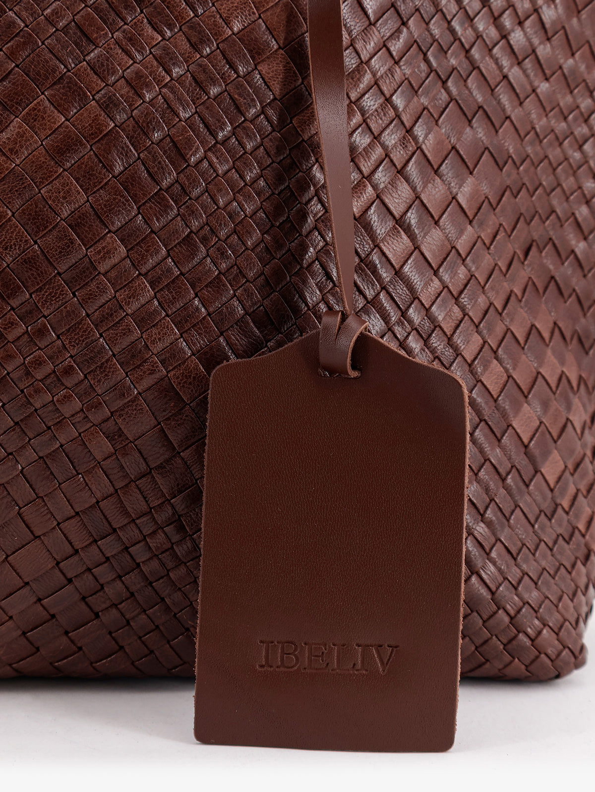 Bazika vegetable leather shoulder bag with woven pattern