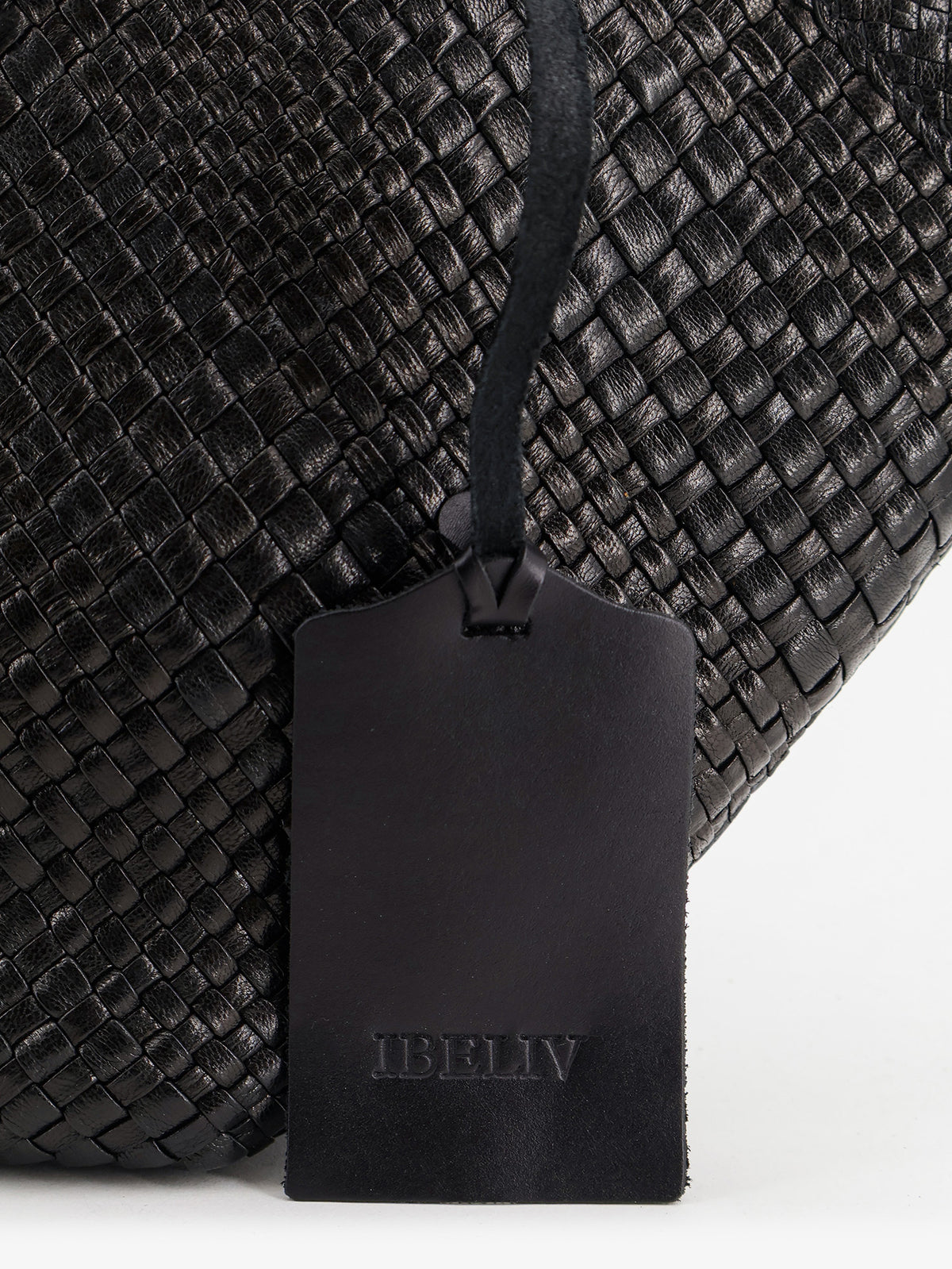 Trinity Medium vegetable leather shoulder bag with woven pattern