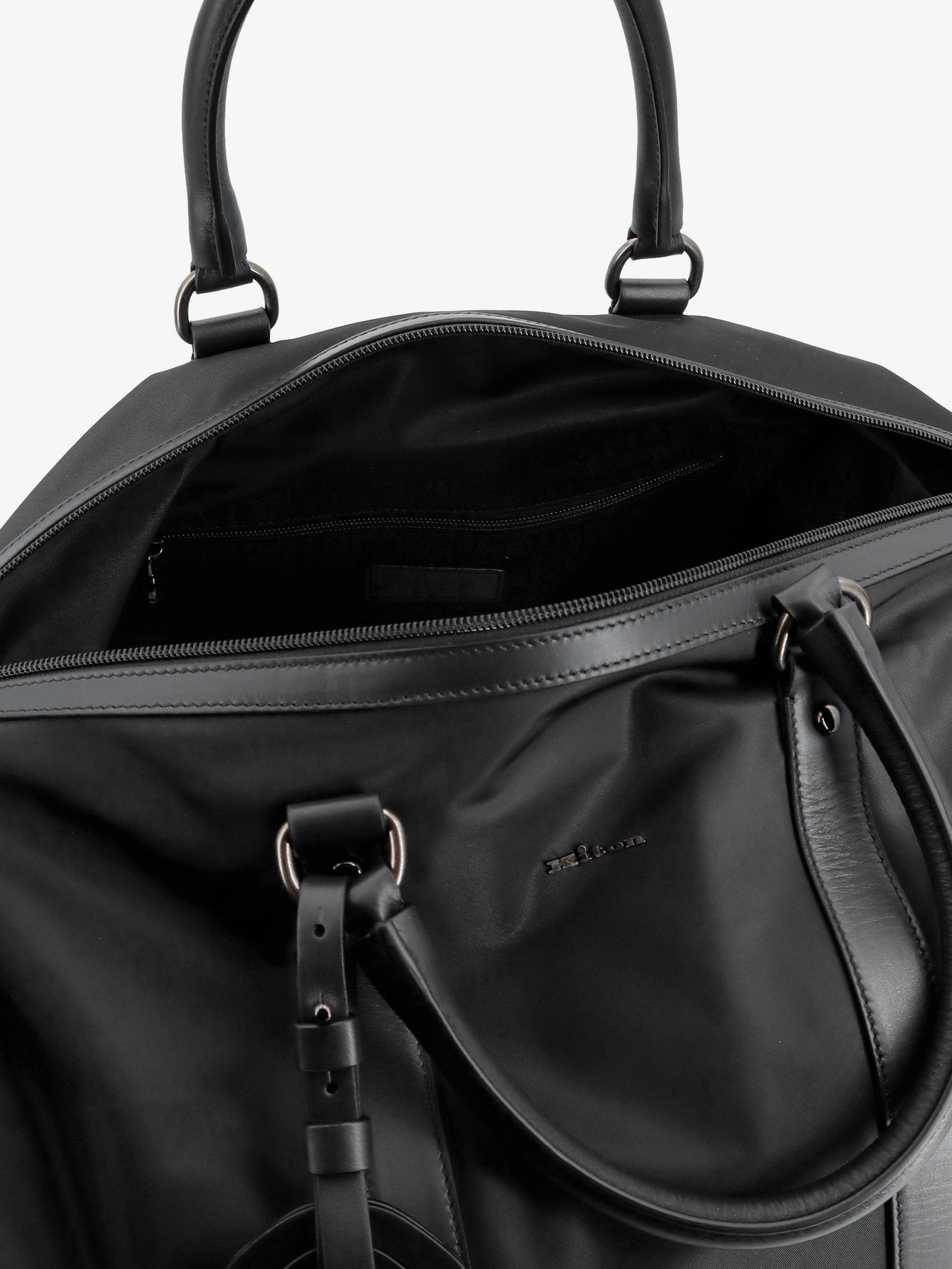 Nylon travel bag with leather inserts