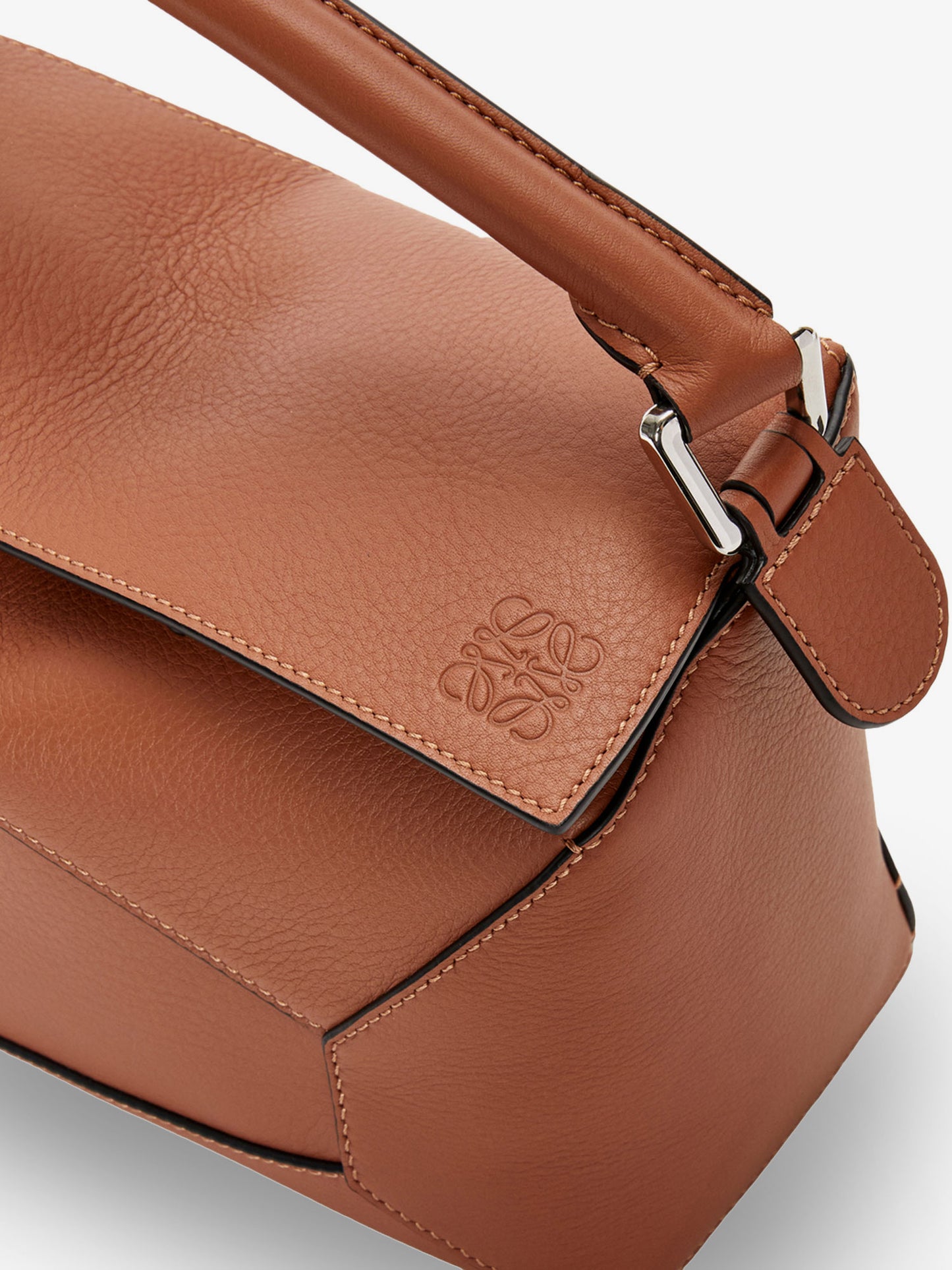 Puzzle Edge leather handbag with engraved Anagram logo