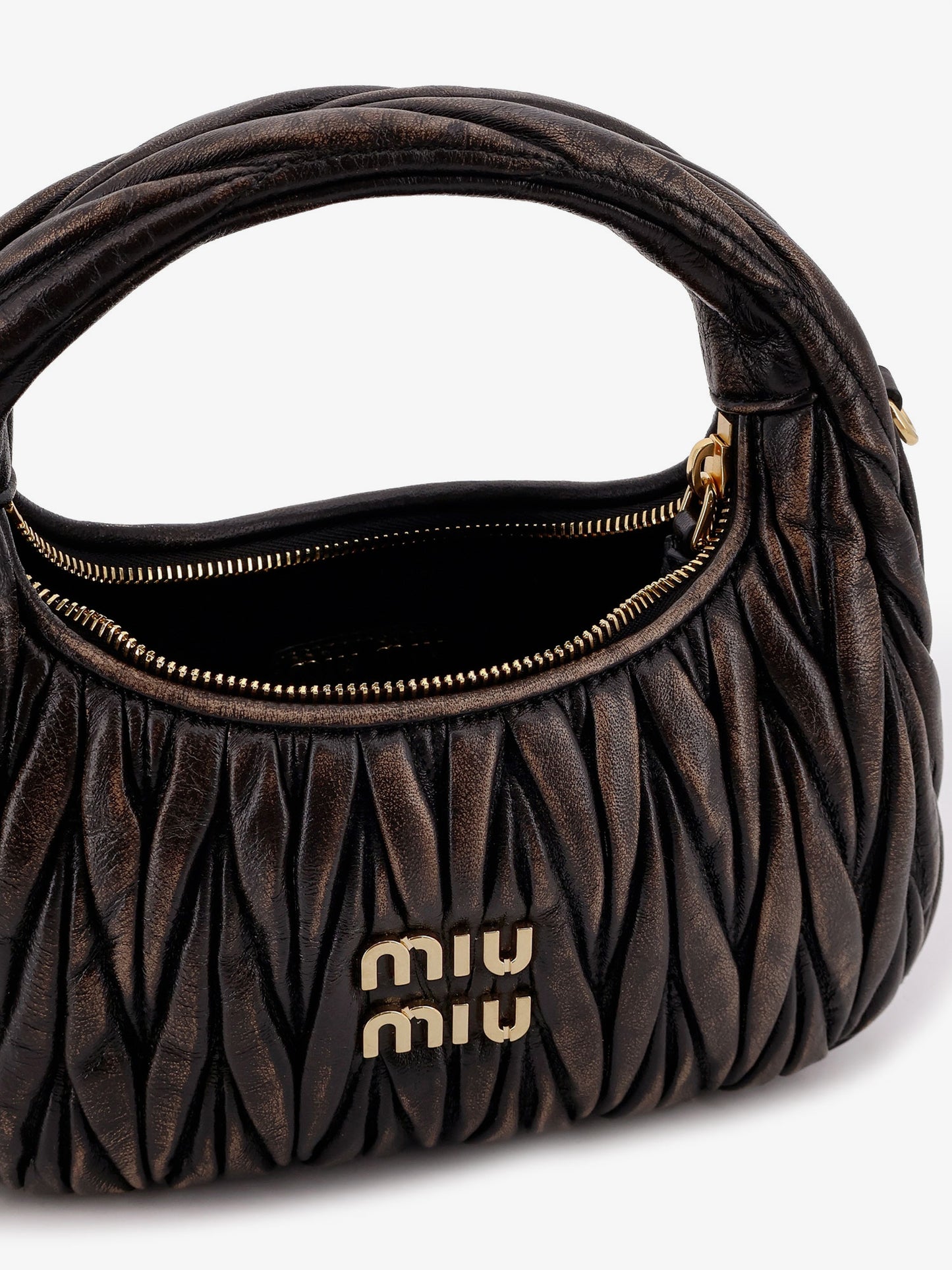Wander quilted leather crossbody bag with a vintage effect
