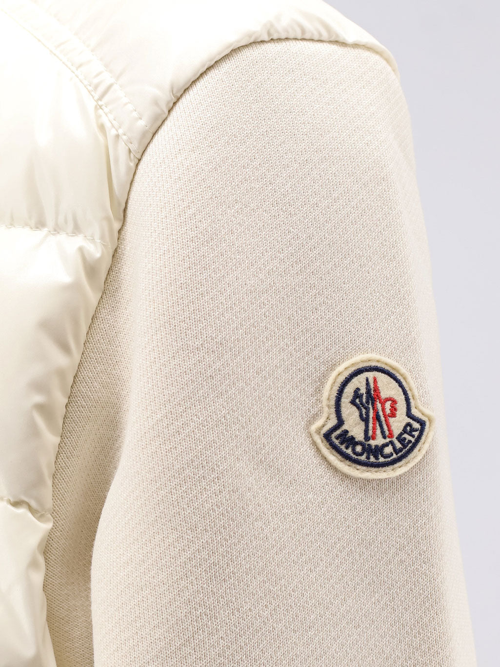 Padded jacket with fabric details