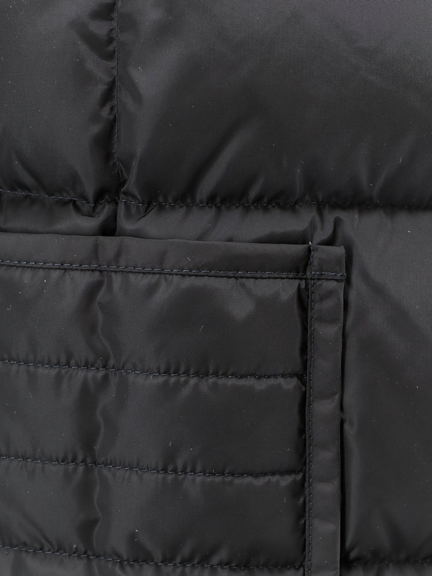 Nylon down jacket with virgin wool inserts
