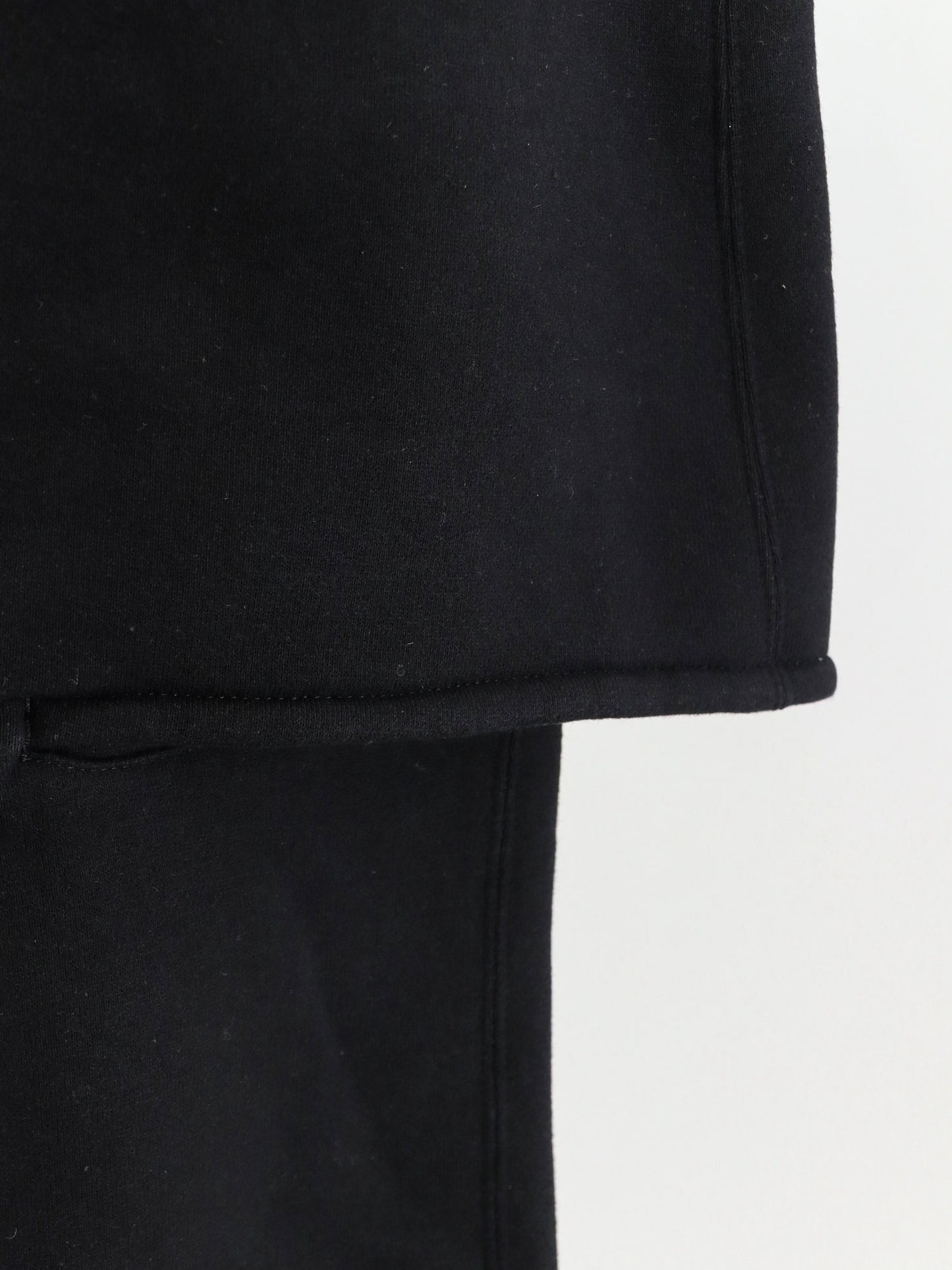 Cotton trousers with a layered trompe l'oeil design