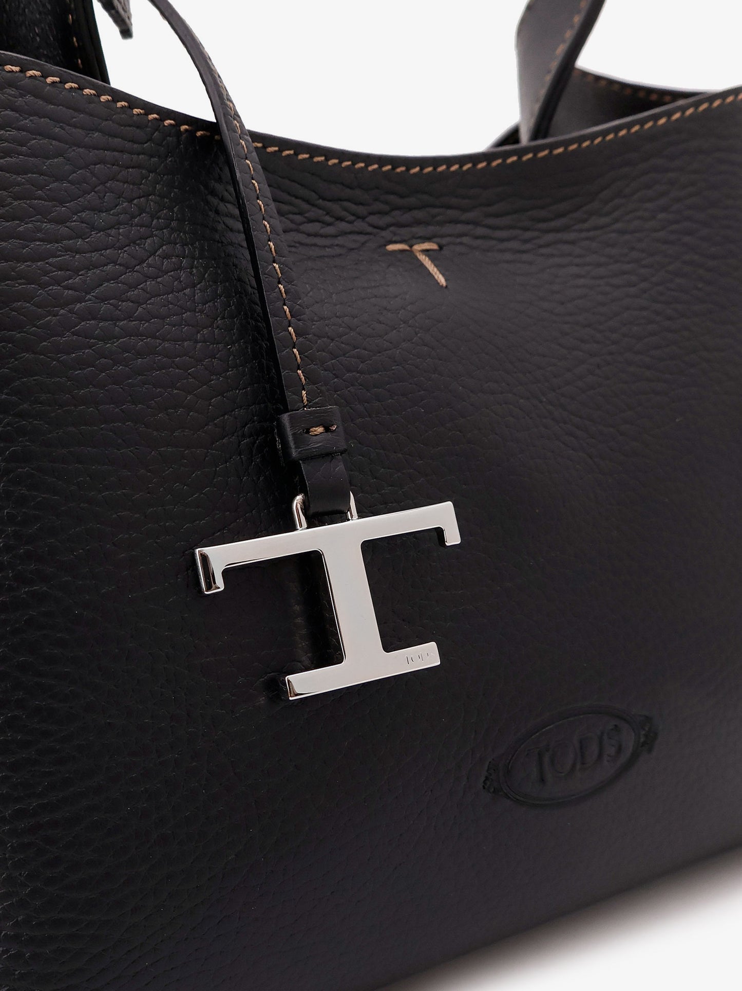 Borsa a tracolla Micro in pelle con iconica impuntura frontale