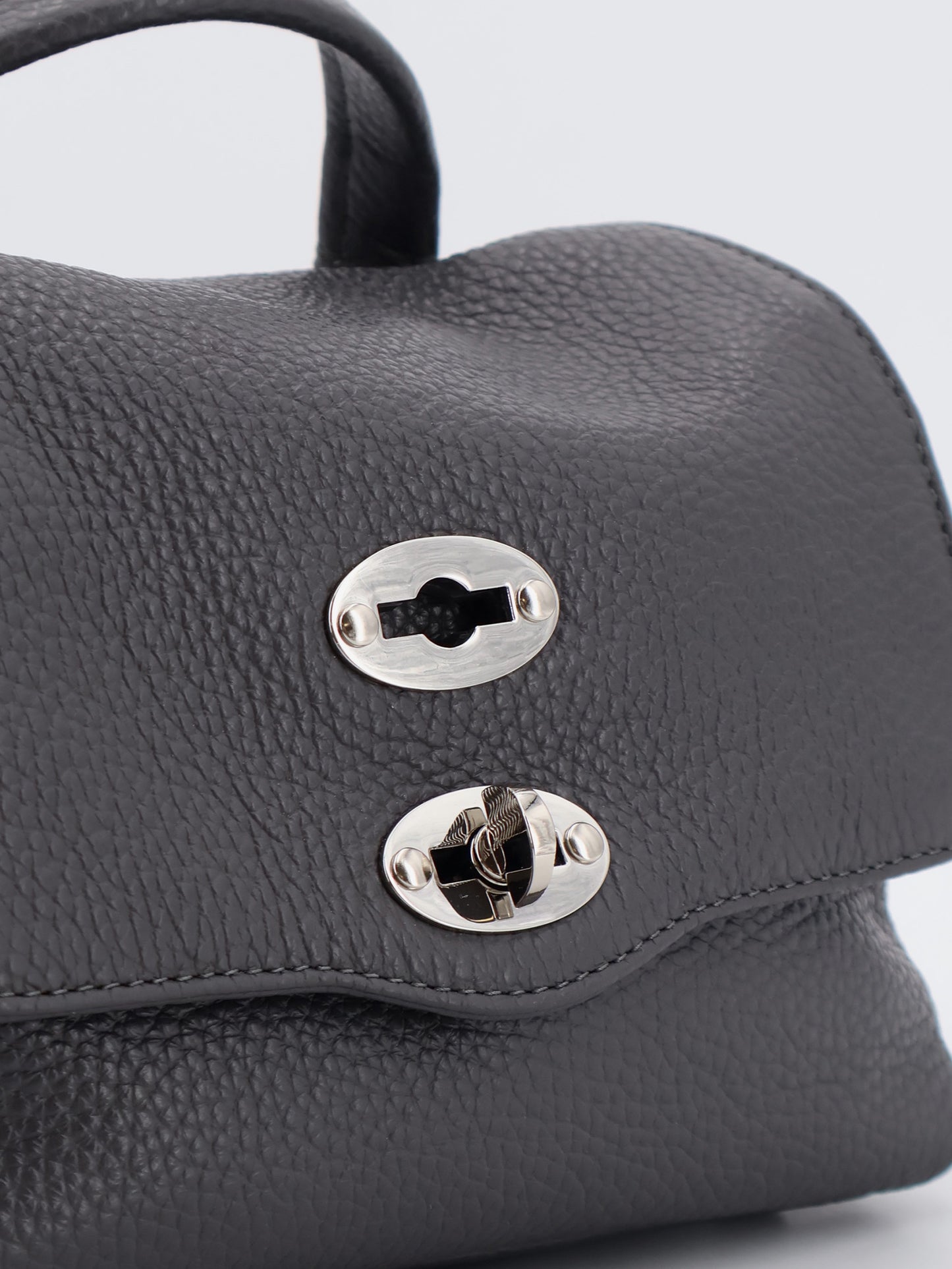 Postina® Baby hammered leather crossbody bag