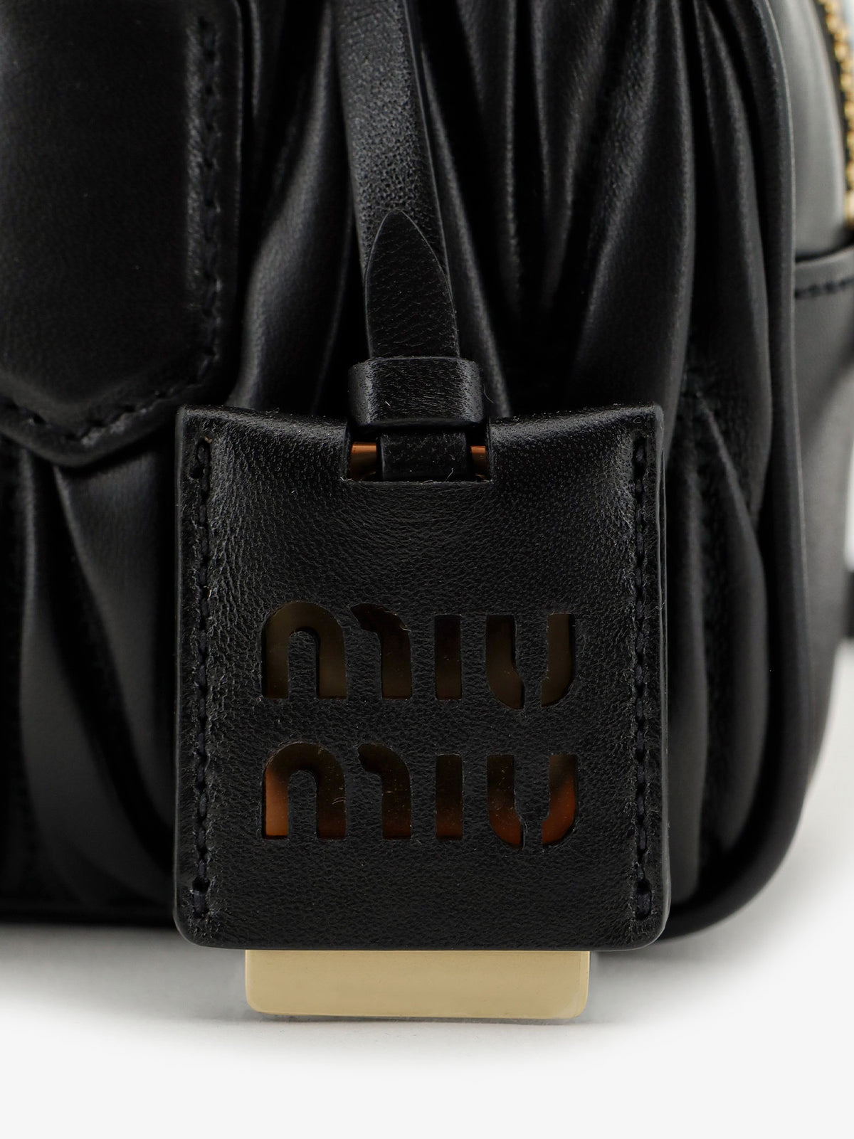 Arcadie matelassé leather crossbody bag