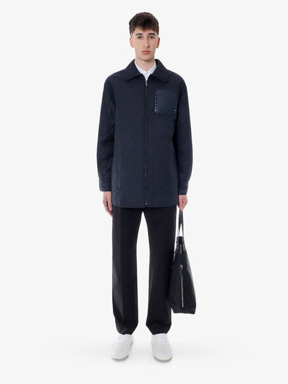 Padded and quilted nylon jacket with iconic studs thumbnail