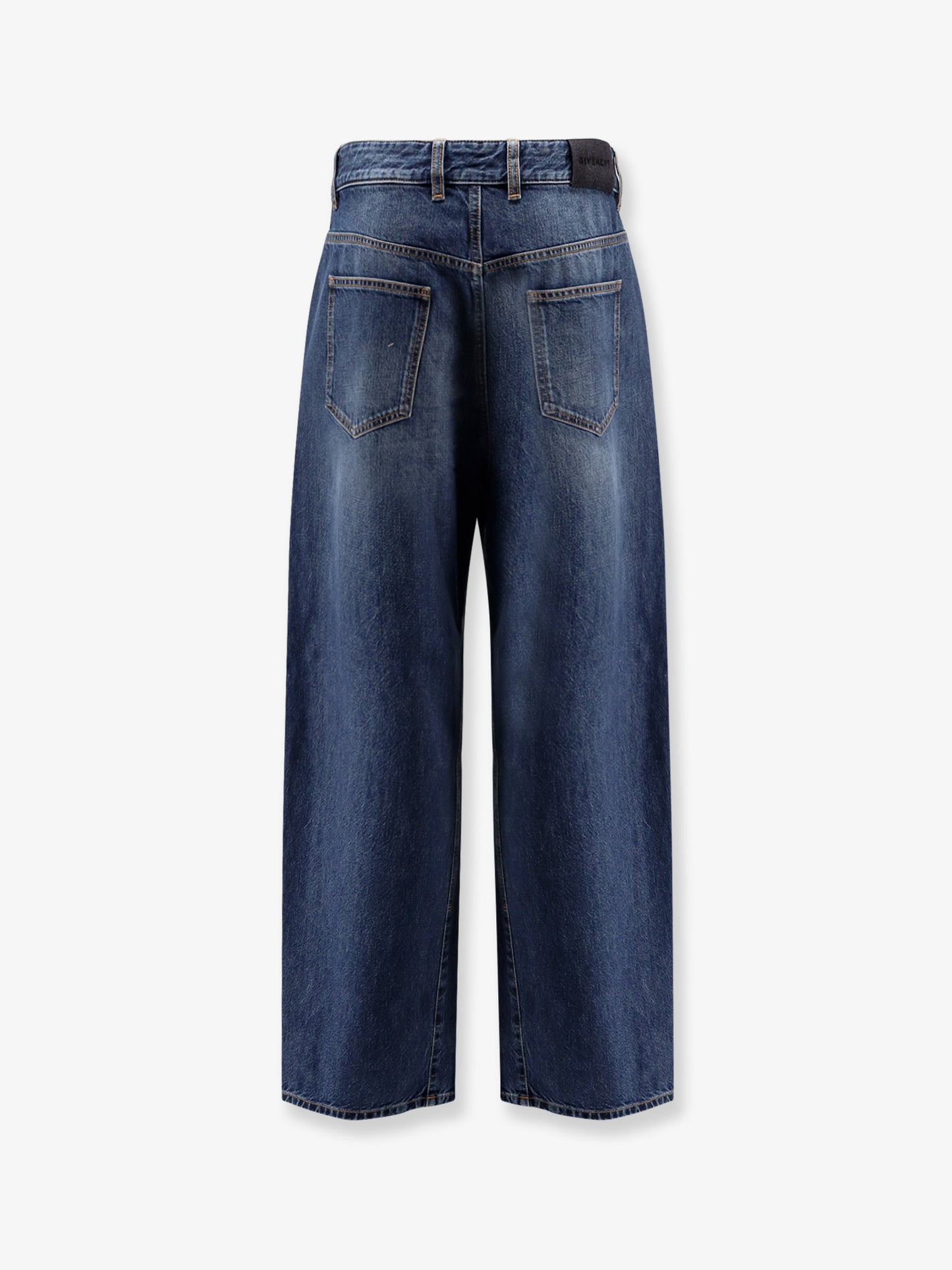 Twisted stone-washed denim jeans