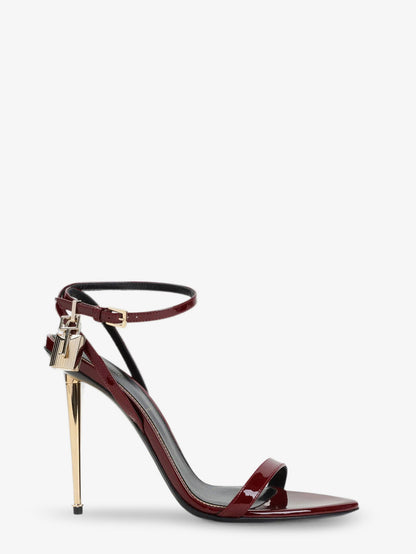 Patent leather sandals with iconic metal padlock thumbnail