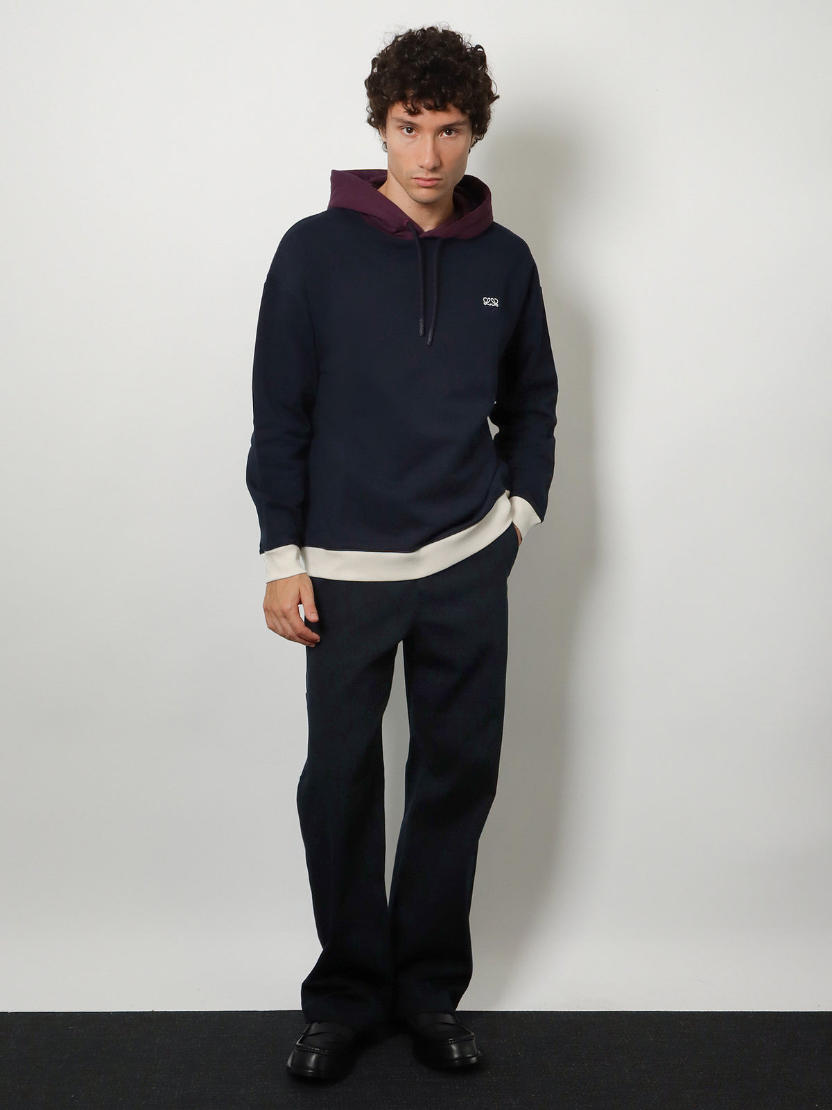 Denim trousers with contrasting embroidered logo