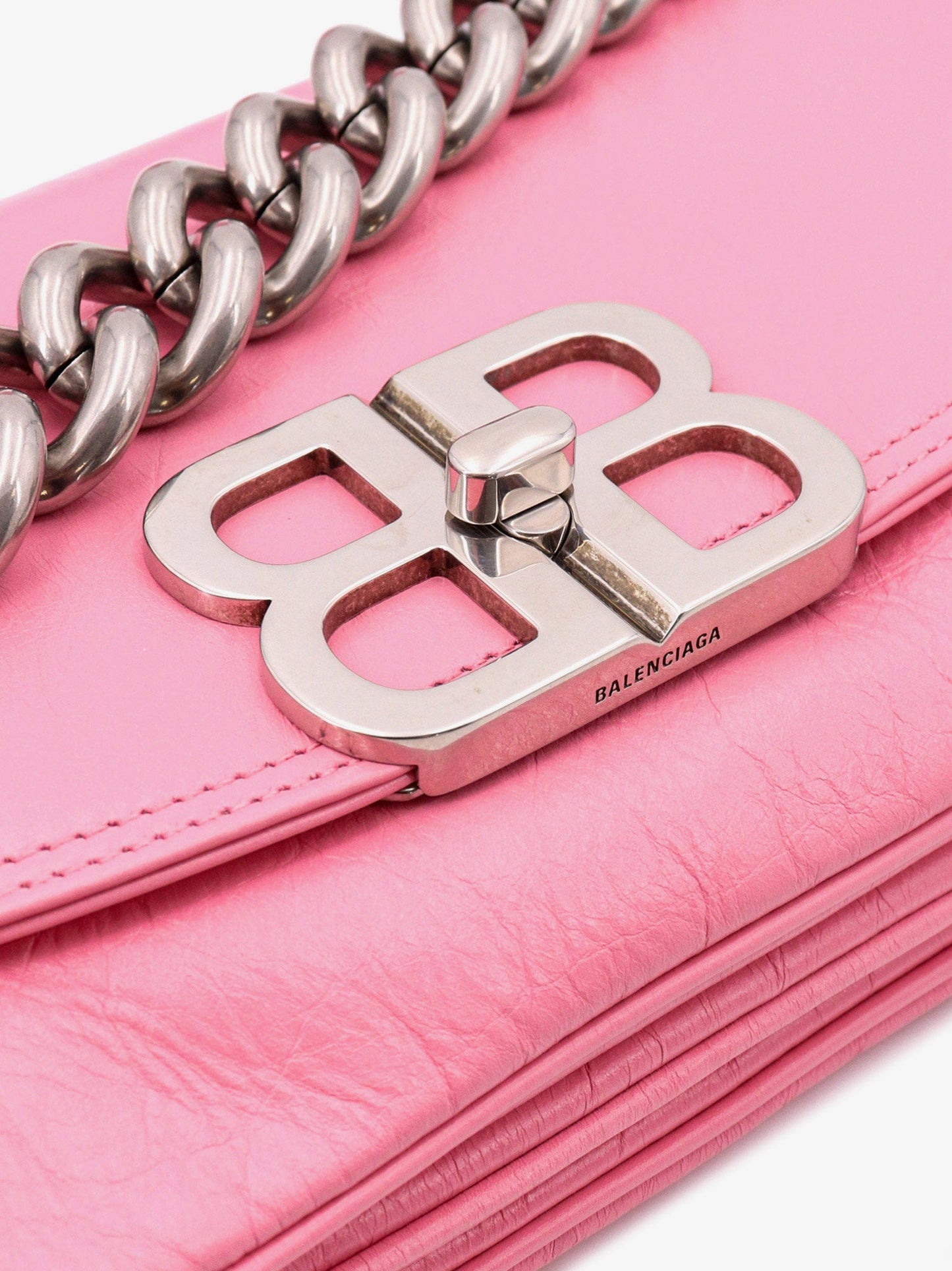 Leather shoulder bag with metal monogram