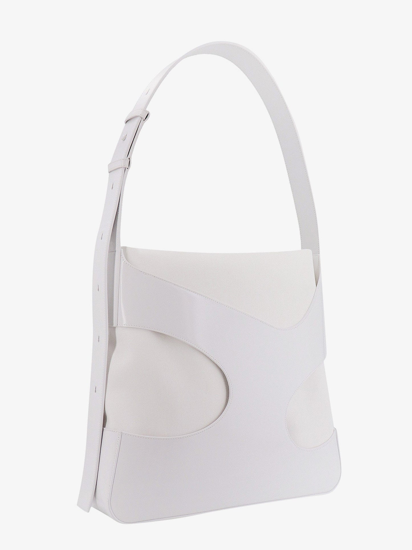 Shoulder bag in leather and canvas with cut-out details