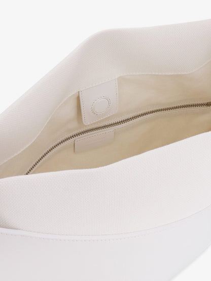 Shoulder bag in leather and canvas with cut-out details thumbnail