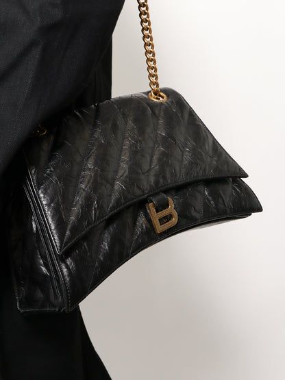 Matelassé leather shoulder bag with frontal monogram thumbnail