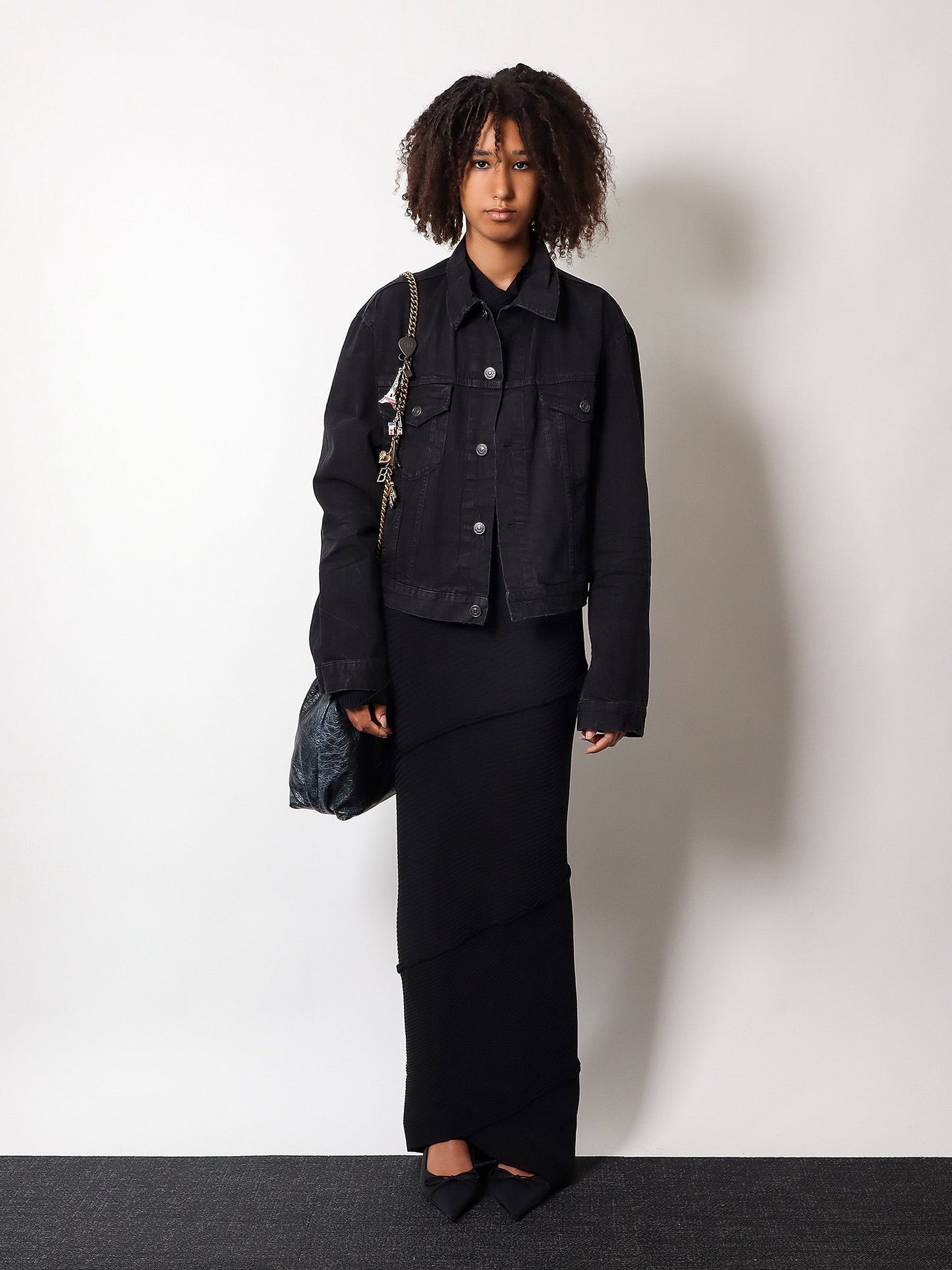 Small fit black denim jacket