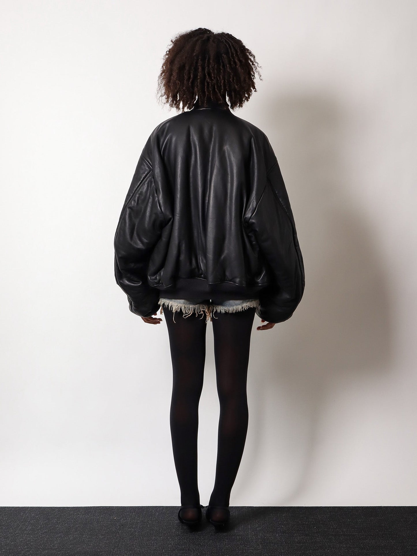 Leather jacket with cargo pocket detail on the sleeve