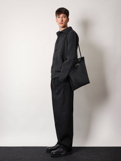 Shoulder bag with woven motif, zip closure and leather shoulder strap with metal knot detail thumbnail